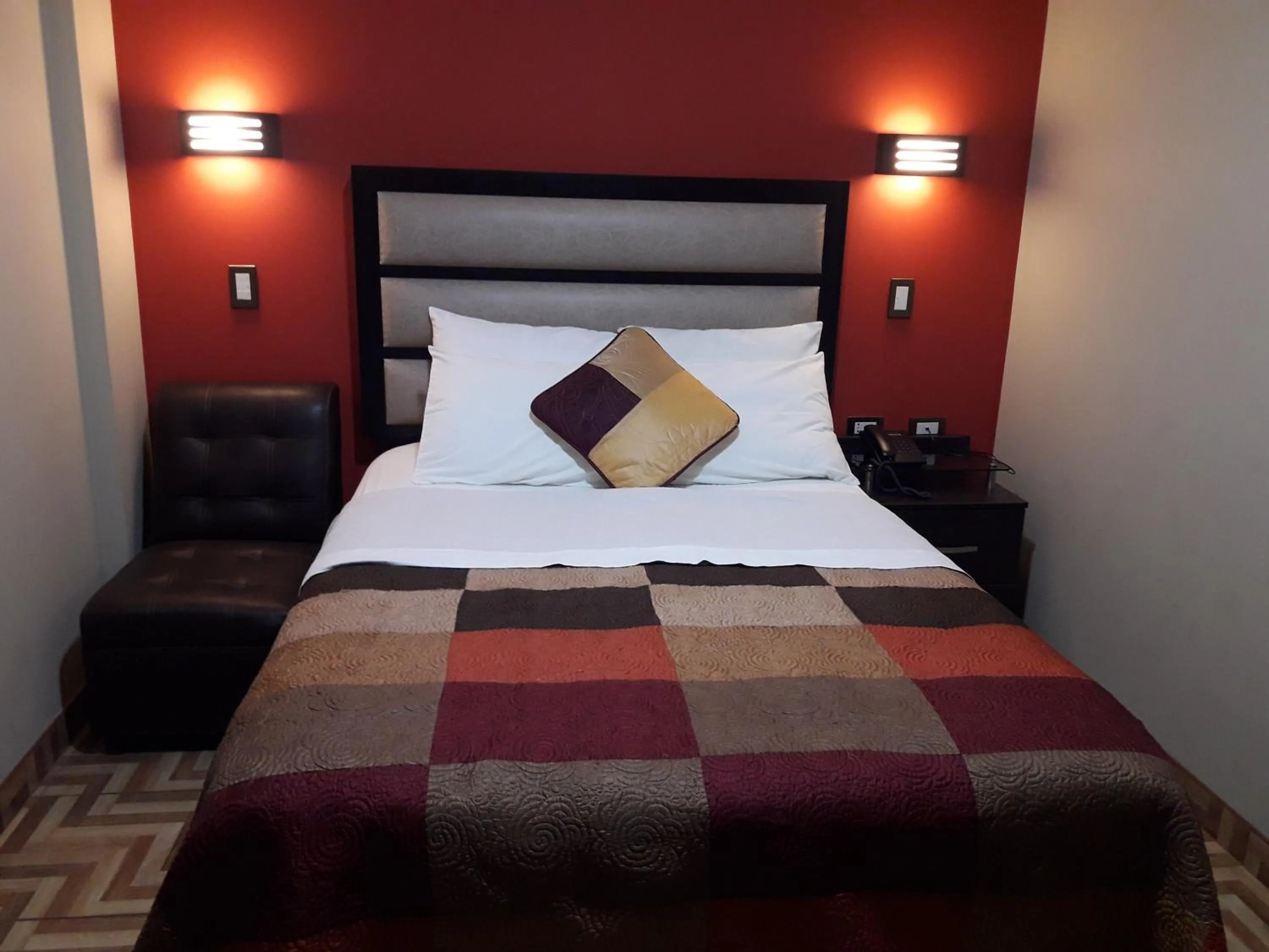 Bed in Gavina Inn Hotel