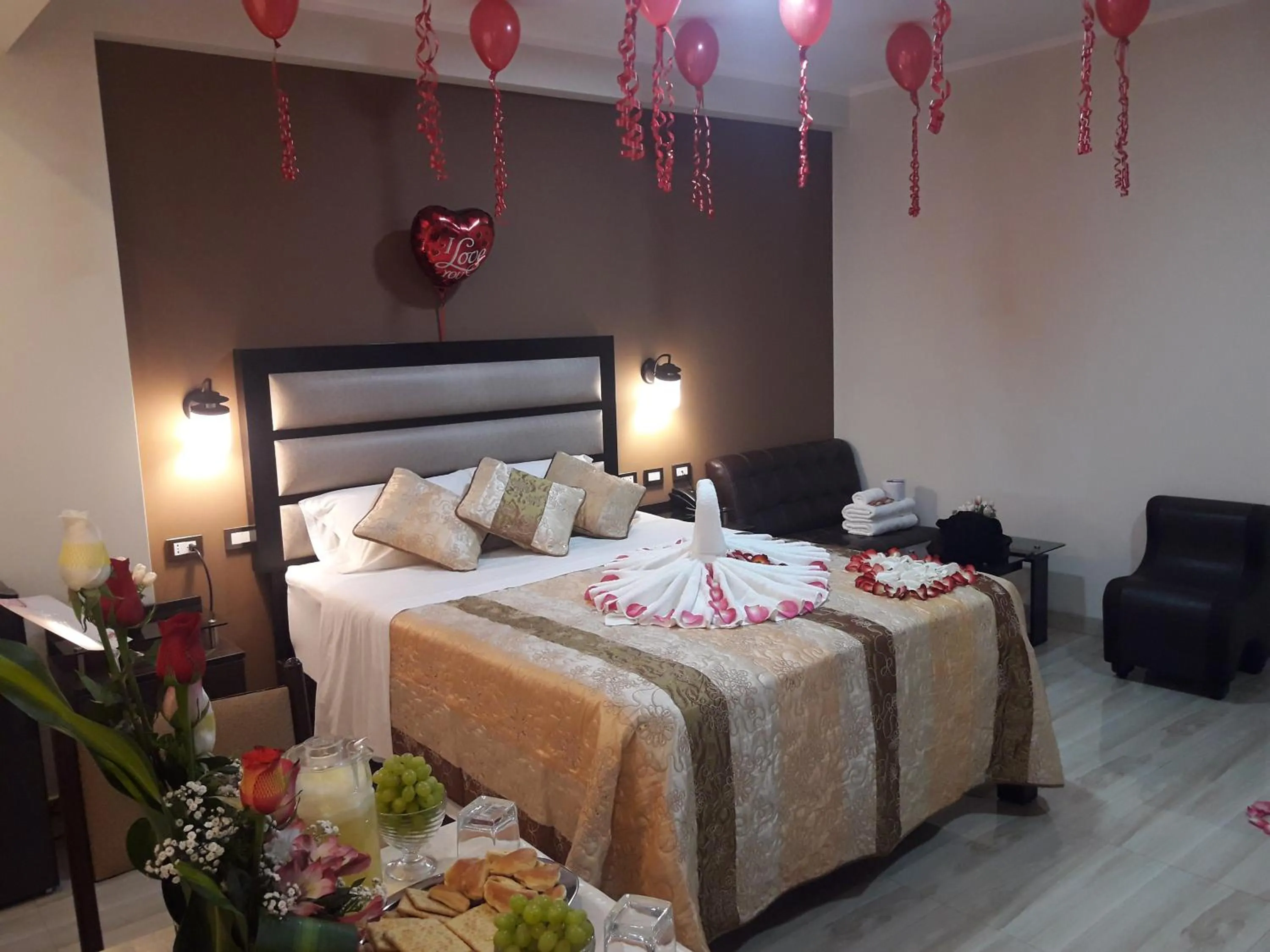 Bed in Gavina Inn Hotel