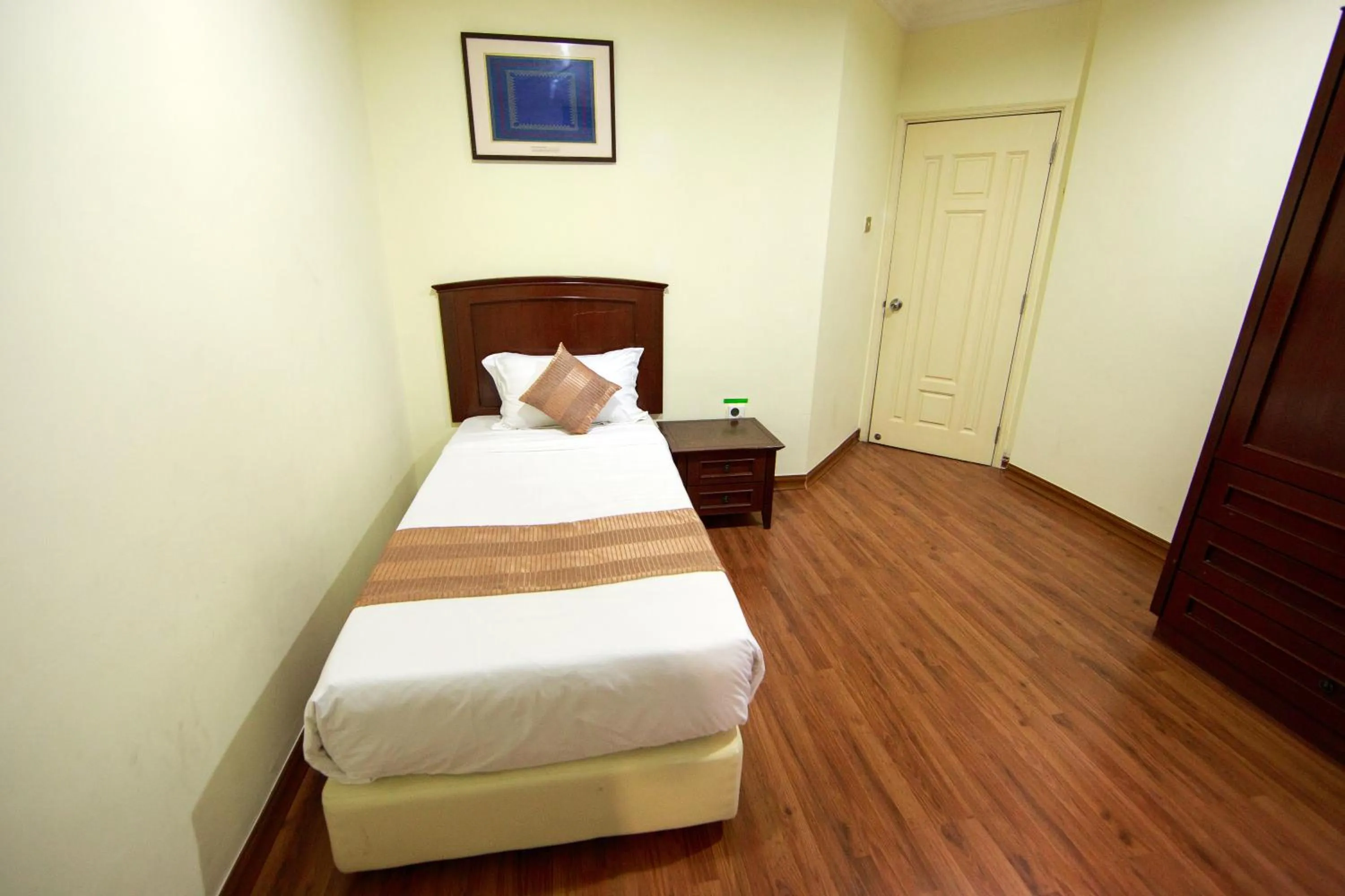 Bed in Beta Service Apartment