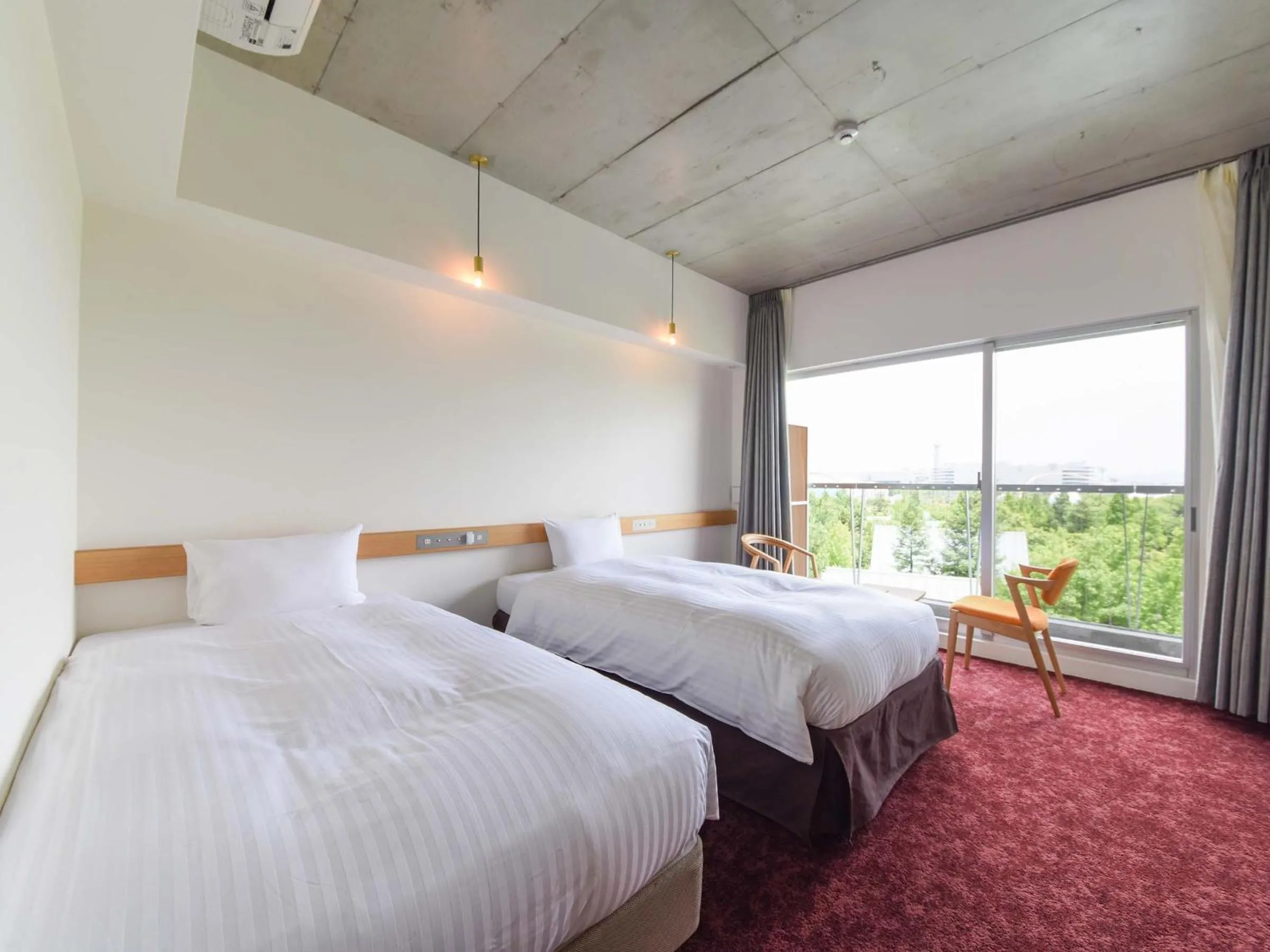 Bed in Hotel Lodge Maishima