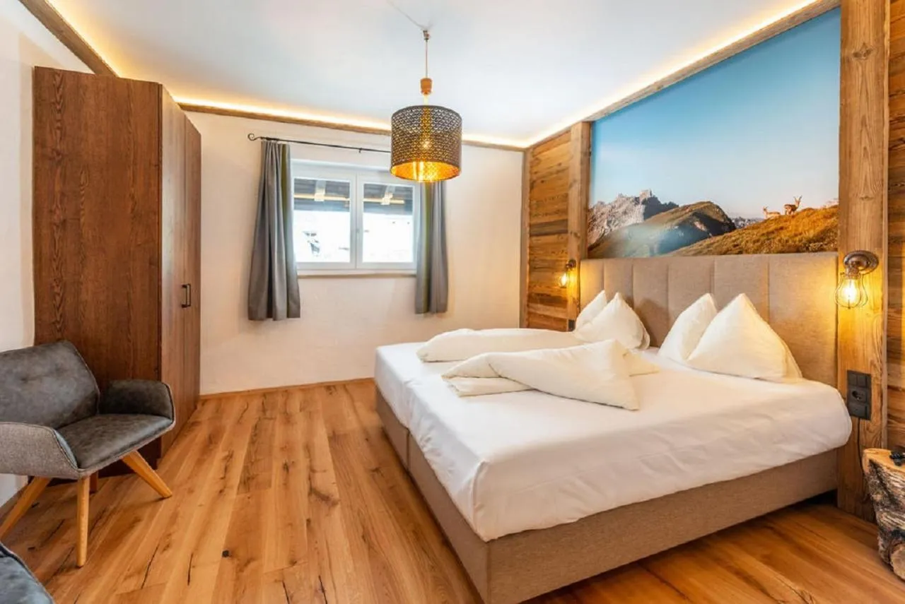 Bedroom, Bed in Aktivhotel Pehab - Dachstein Rooftop-Spa