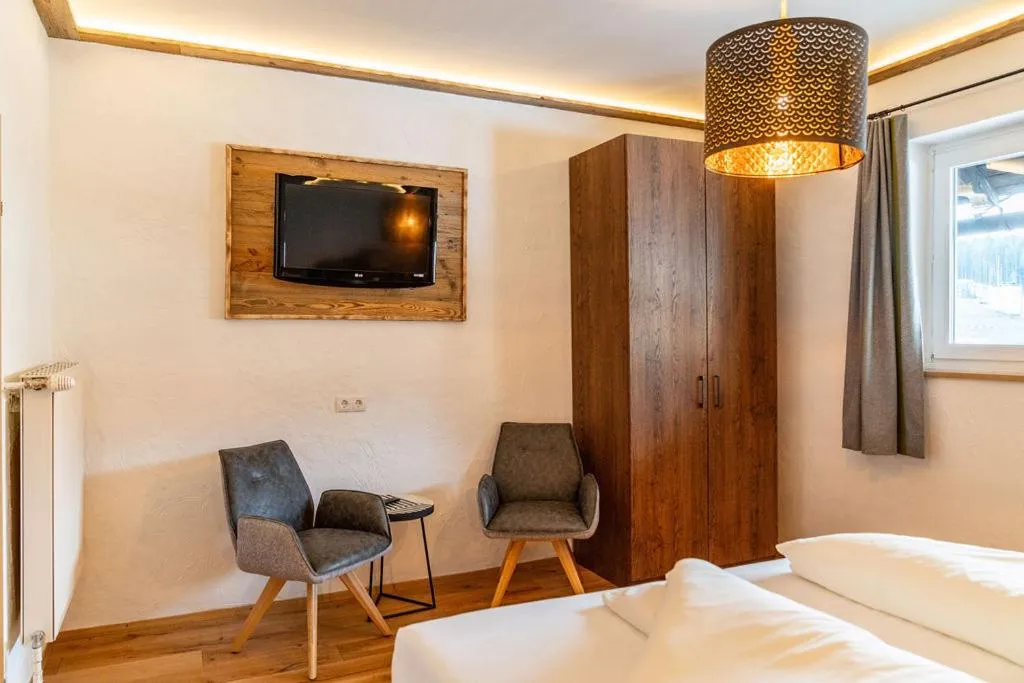 Seating area, Bed in Aktivhotel Pehab - Dachstein Rooftop-Spa