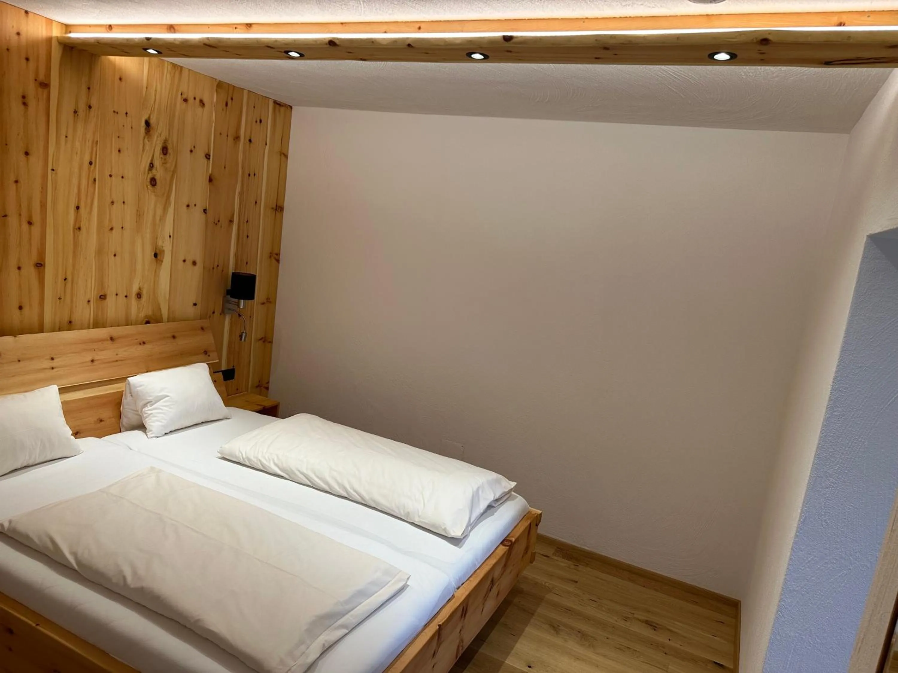 Bedroom, Bed in Aktivhotel Pehab - Dachstein Rooftop-Spa