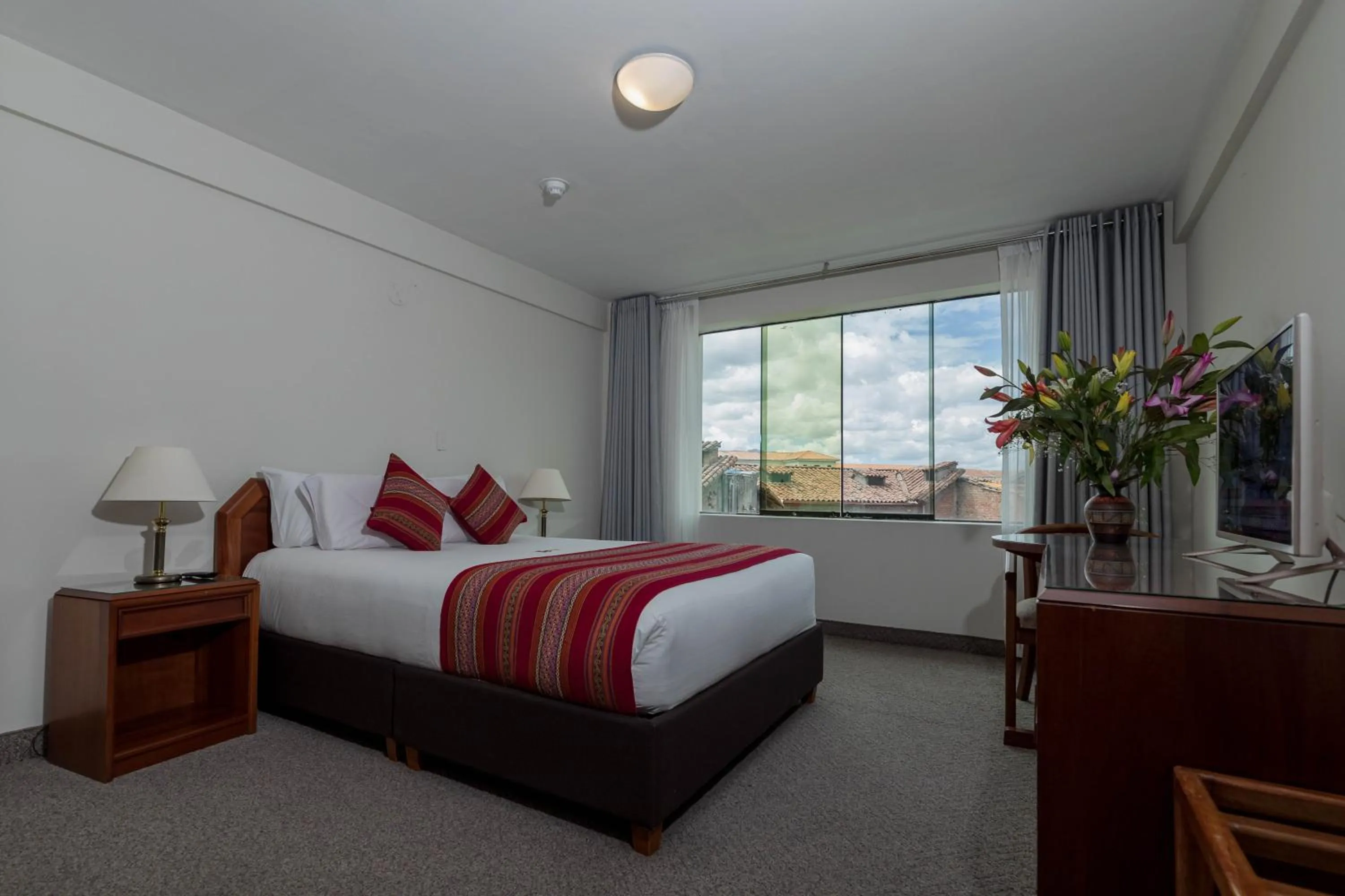 Bed in Quechua Plaza Hotel