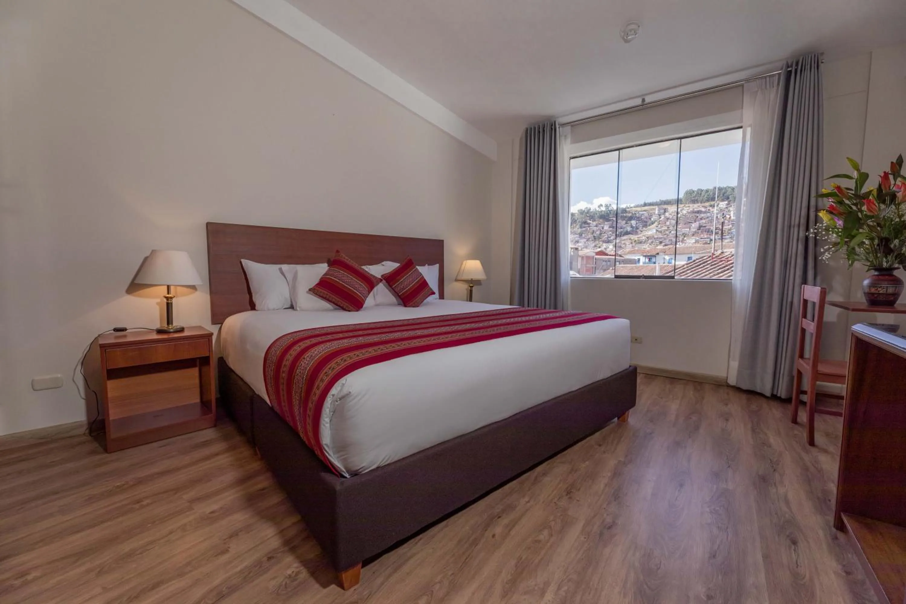Bed in Quechua Plaza Hotel