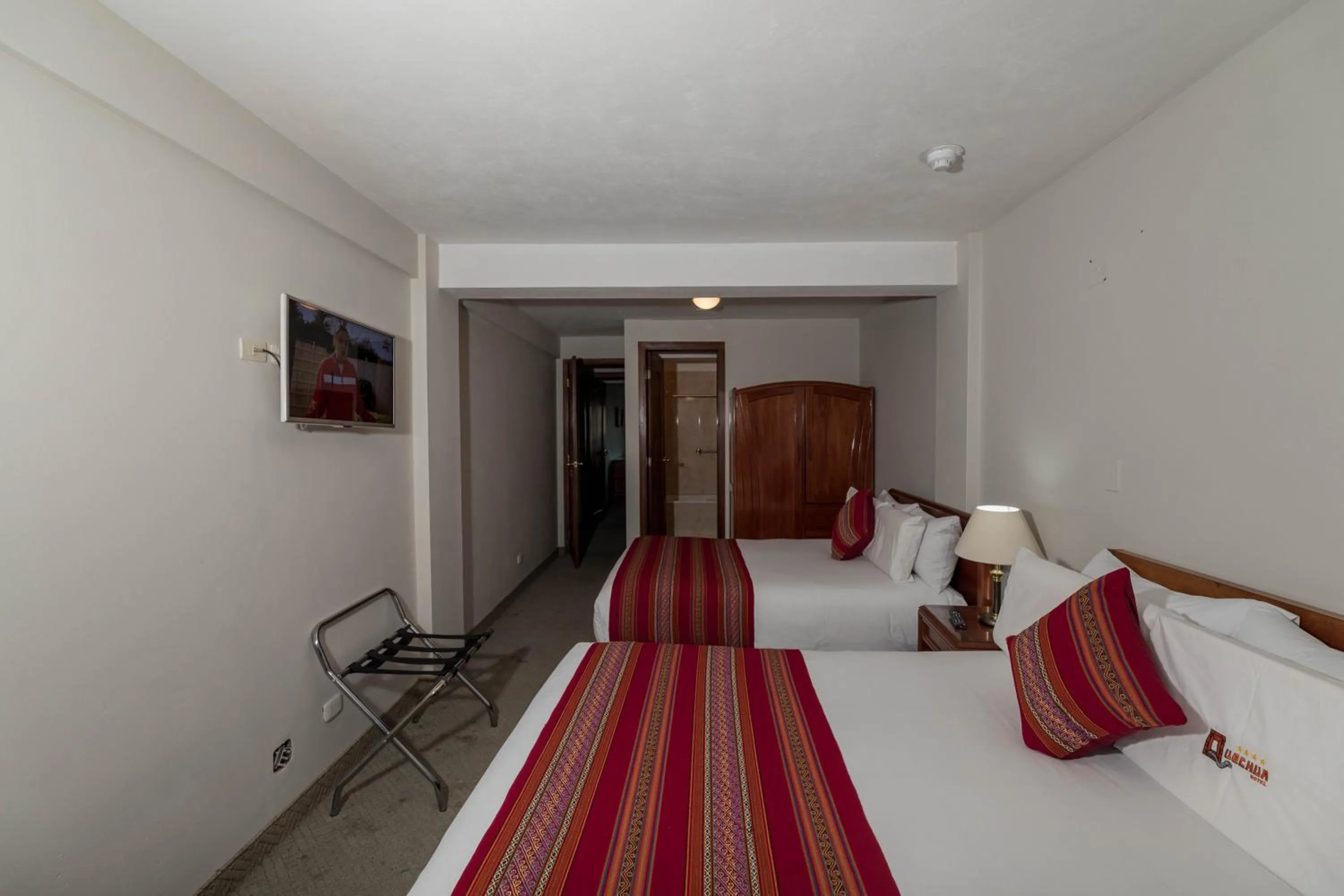 Bed in Quechua Plaza Hotel