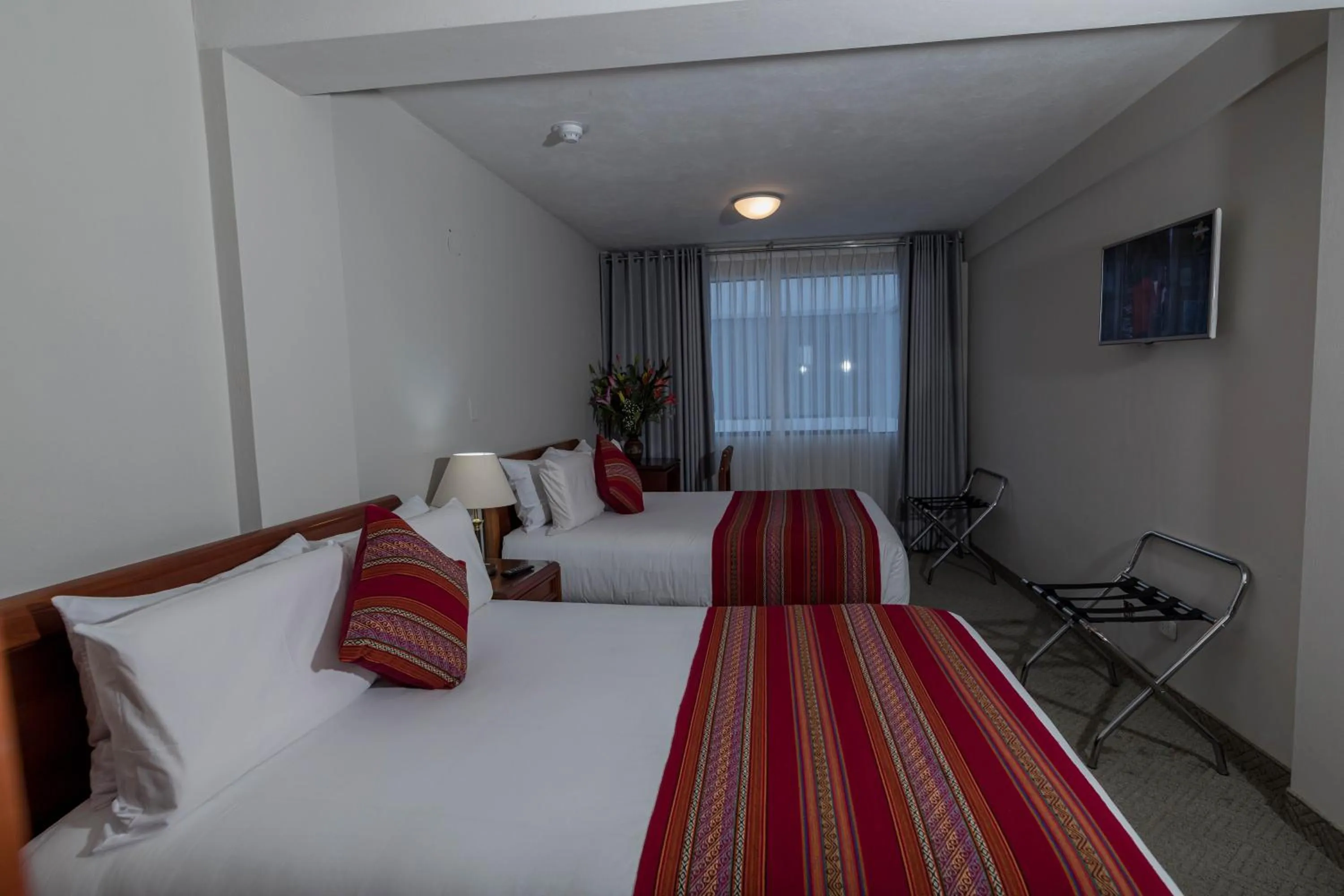 Bed in Quechua Plaza Hotel