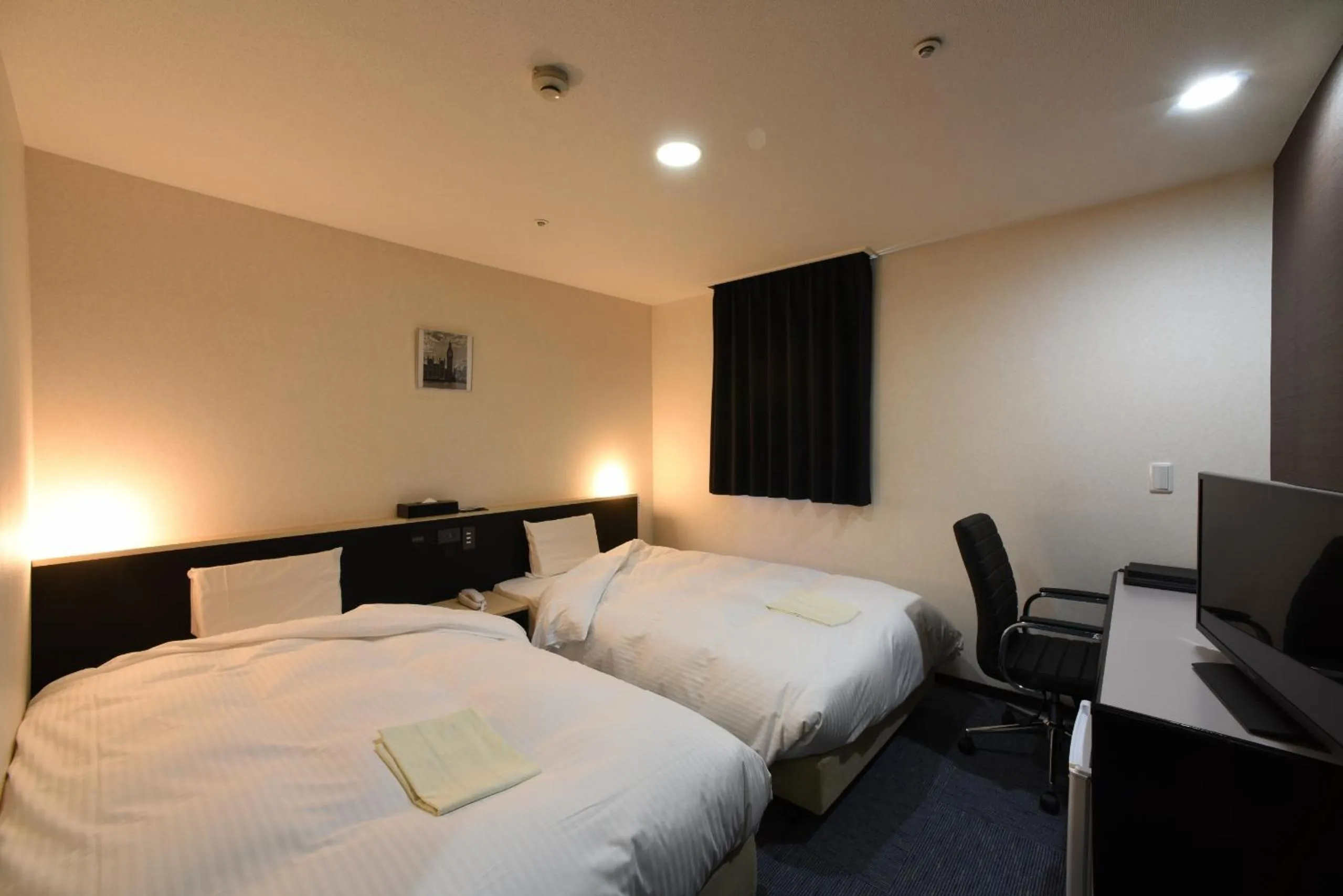 Photo of the whole room, Bed in R Hotels Inn Hokkaido Asahikawa