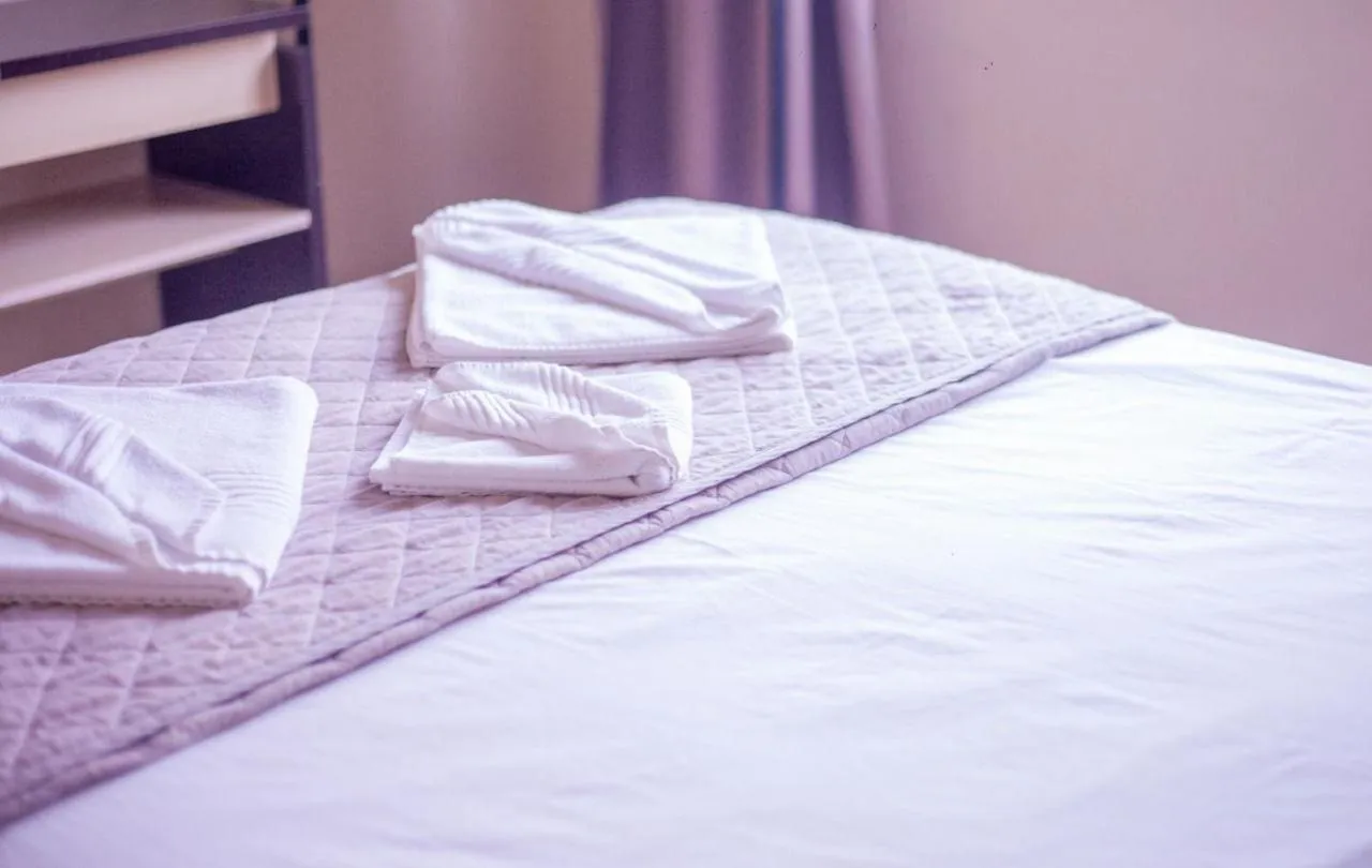 Bed in Hotel Ermitage