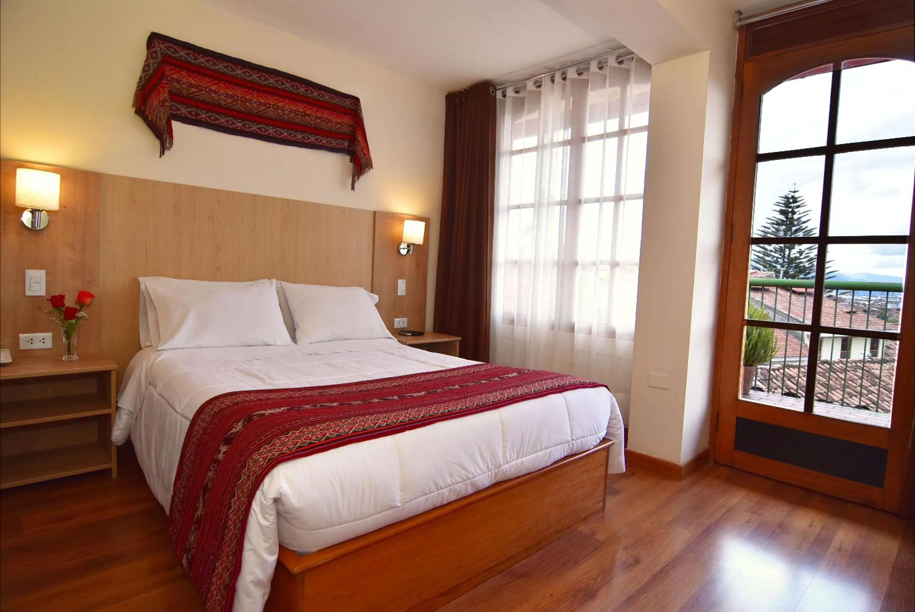 Bed in Hotel Prisma Cusco