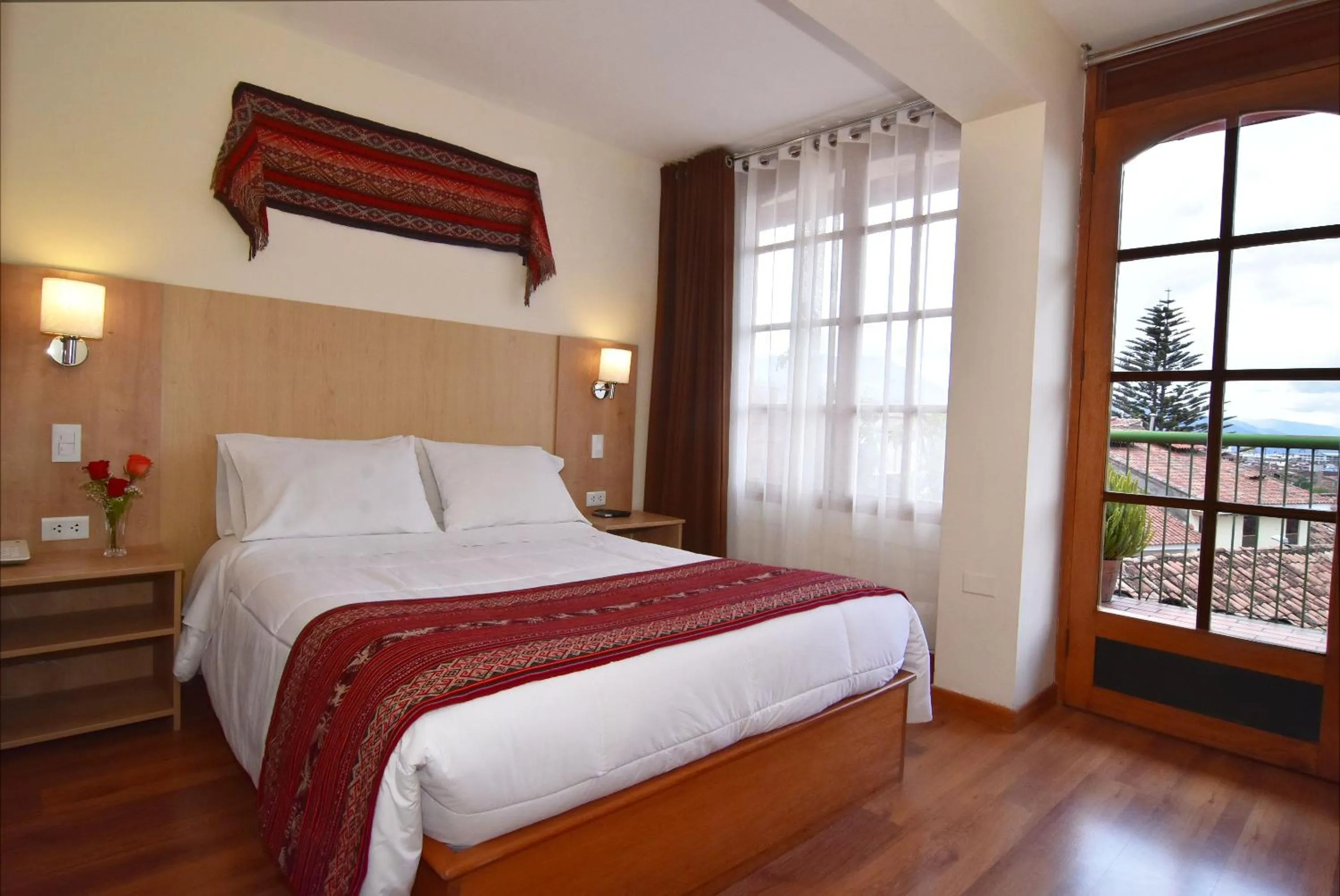 Bed in Hotel Prisma Cusco