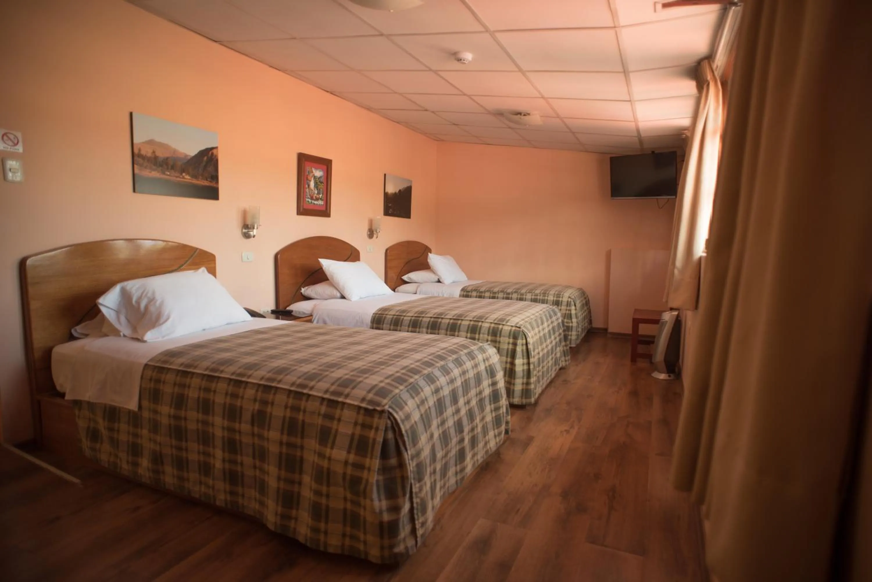 Bed in Hotel Prisma Cusco