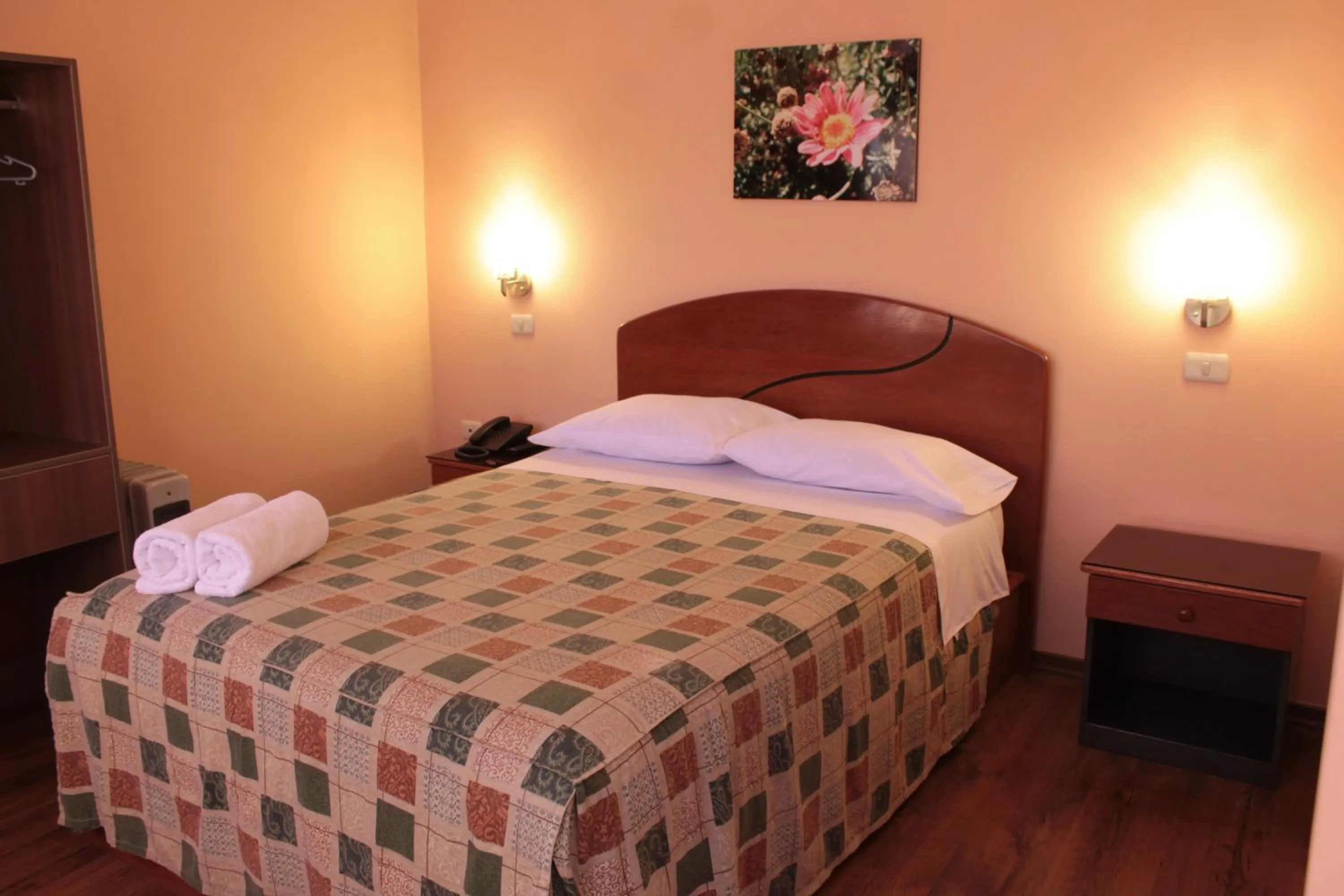 Bed in Hotel Prisma Cusco