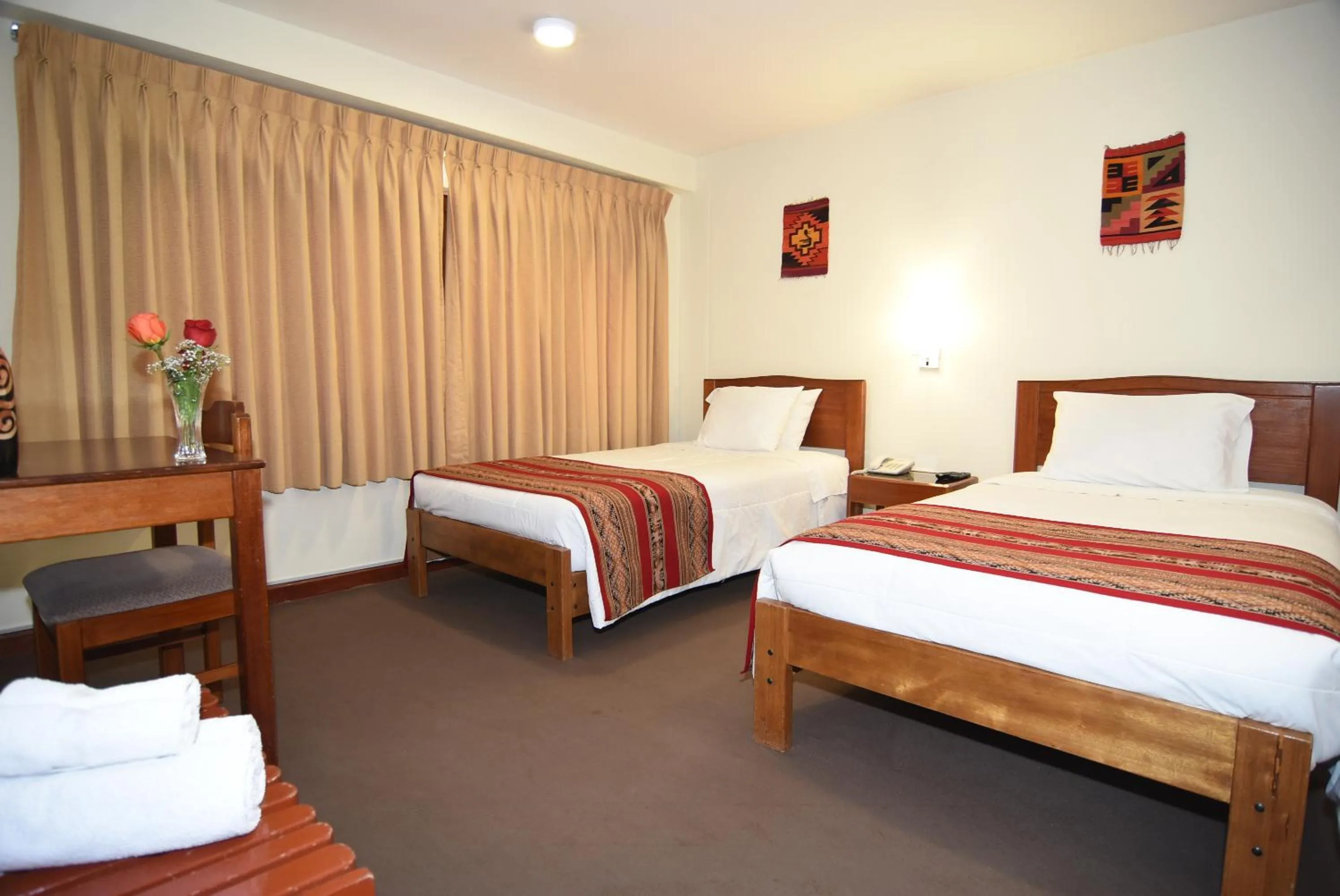 Bed in Hotel Prisma Cusco