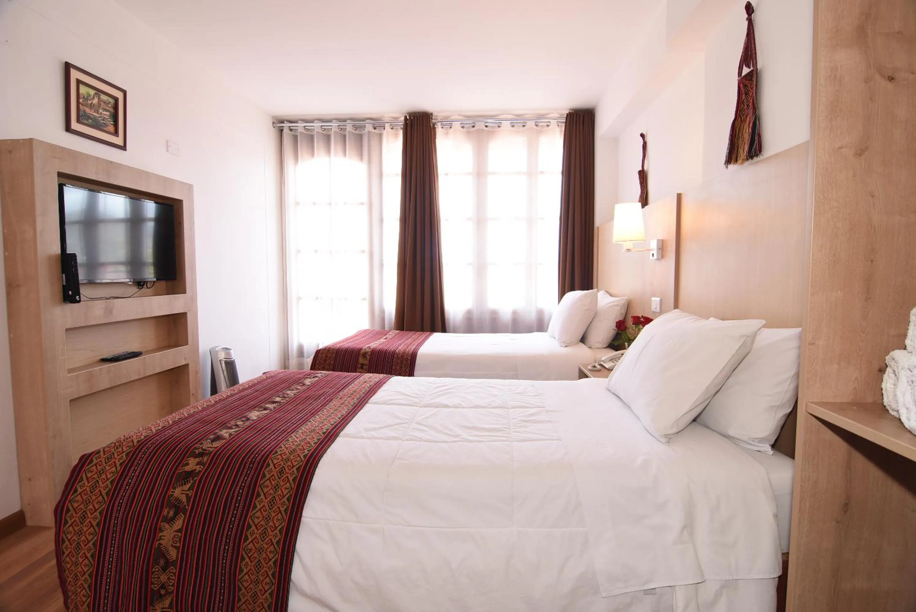 Bed in Hotel Prisma Cusco