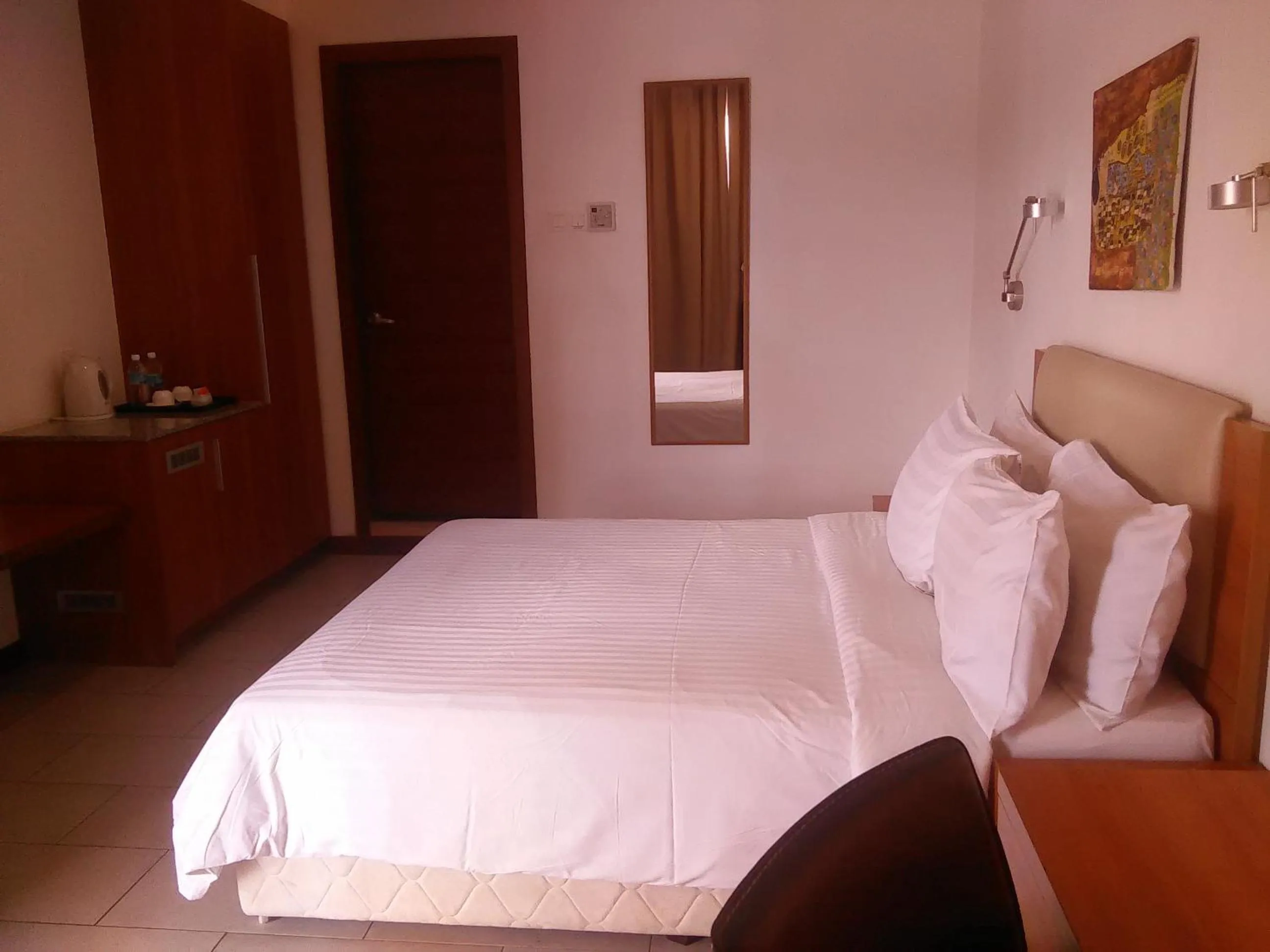 Bedroom, Bed in Gloria Swiss Hotel & Apartment Sandakan