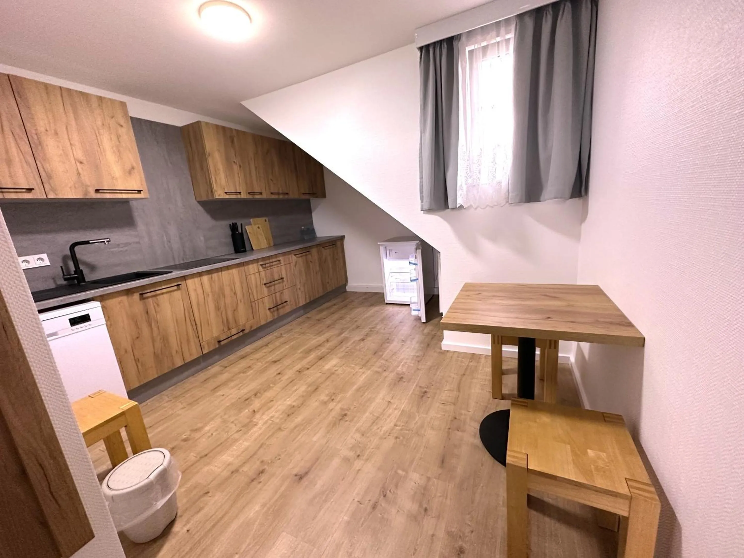 Kitchen or kitchenette in Home Inn Hotel