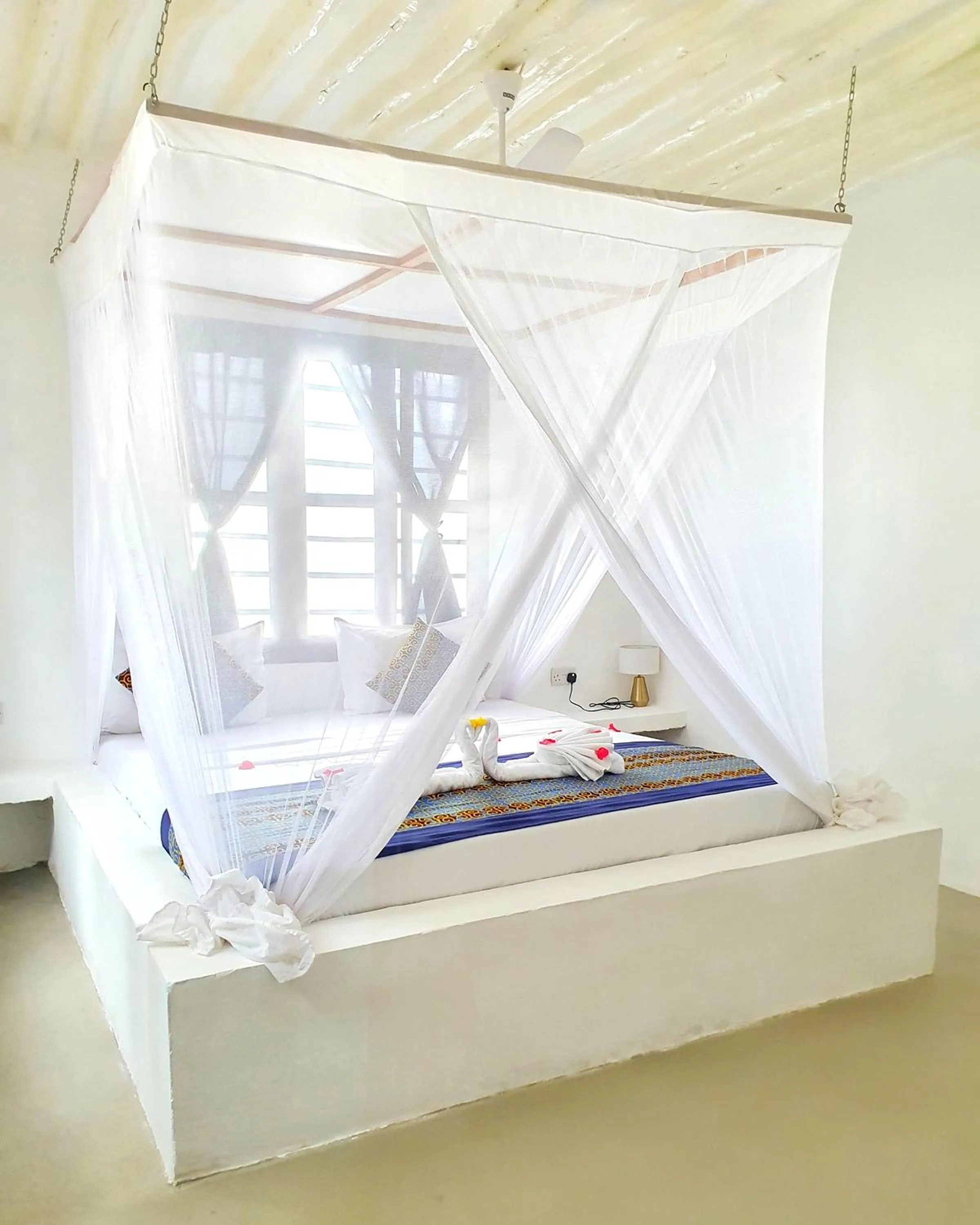 Bed in Blue Palm Zanzibar