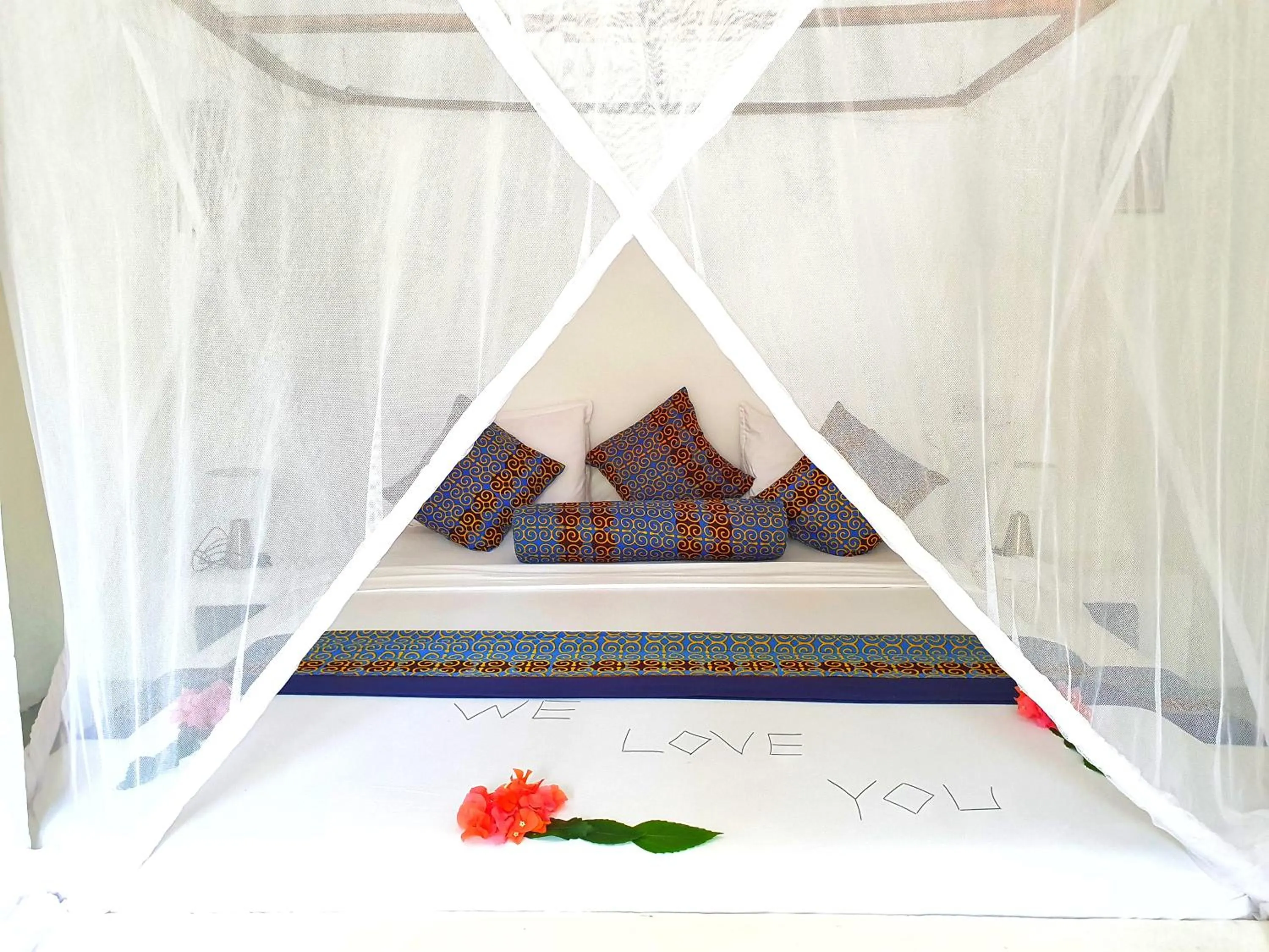 Bed in Blue Palm Zanzibar