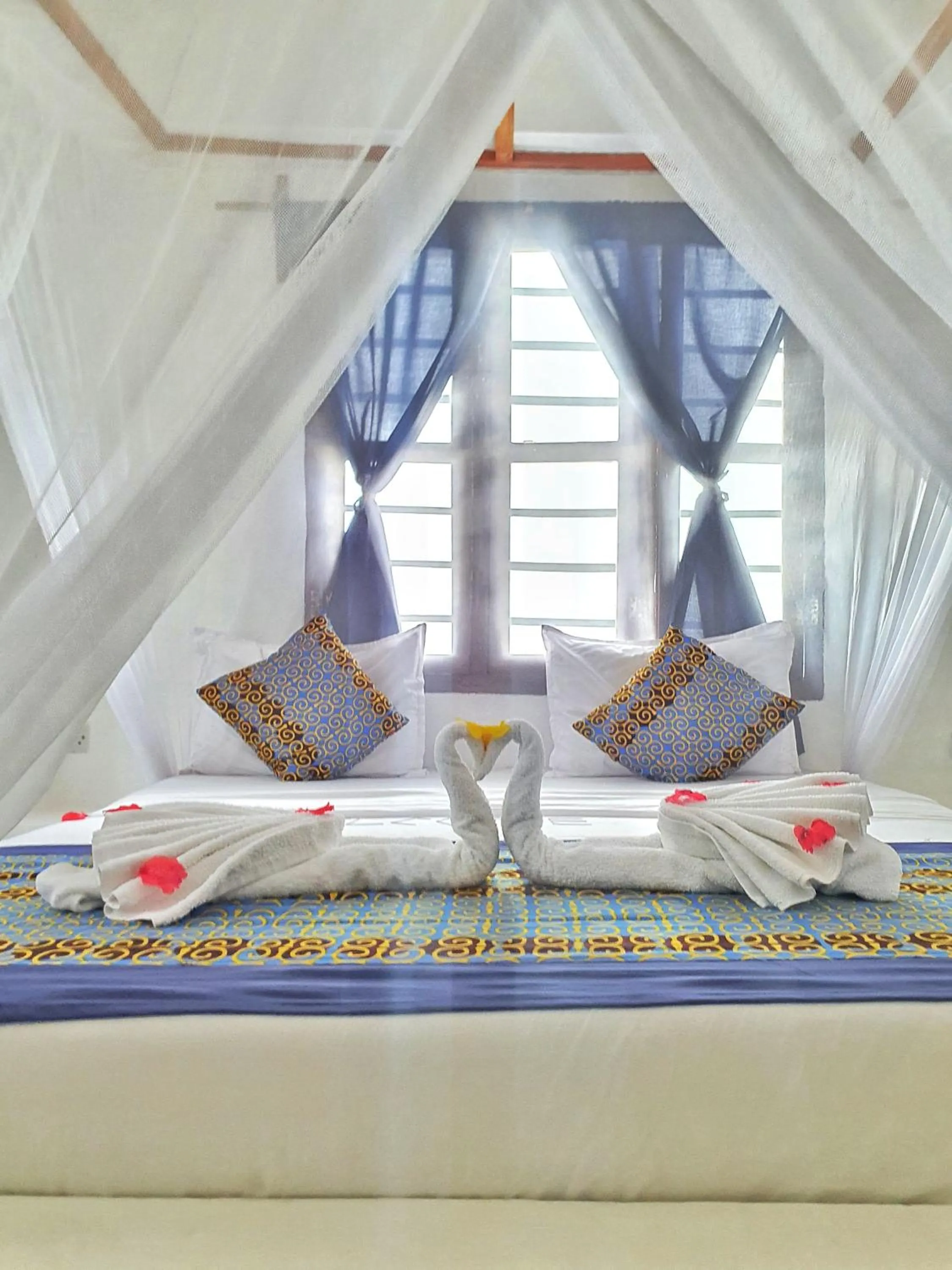Bed in Blue Palm Zanzibar