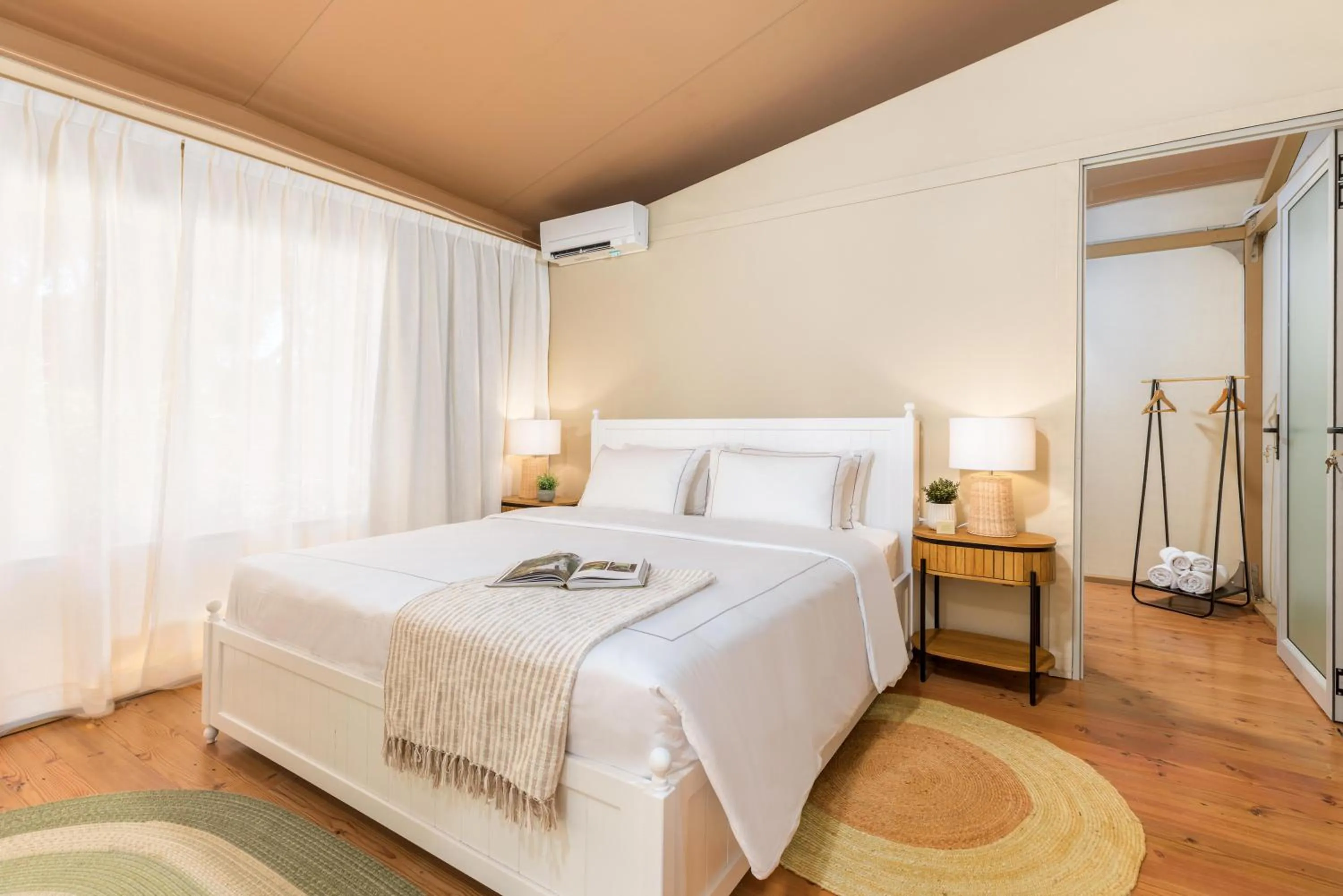 Bed in Arena One 99 Glamping