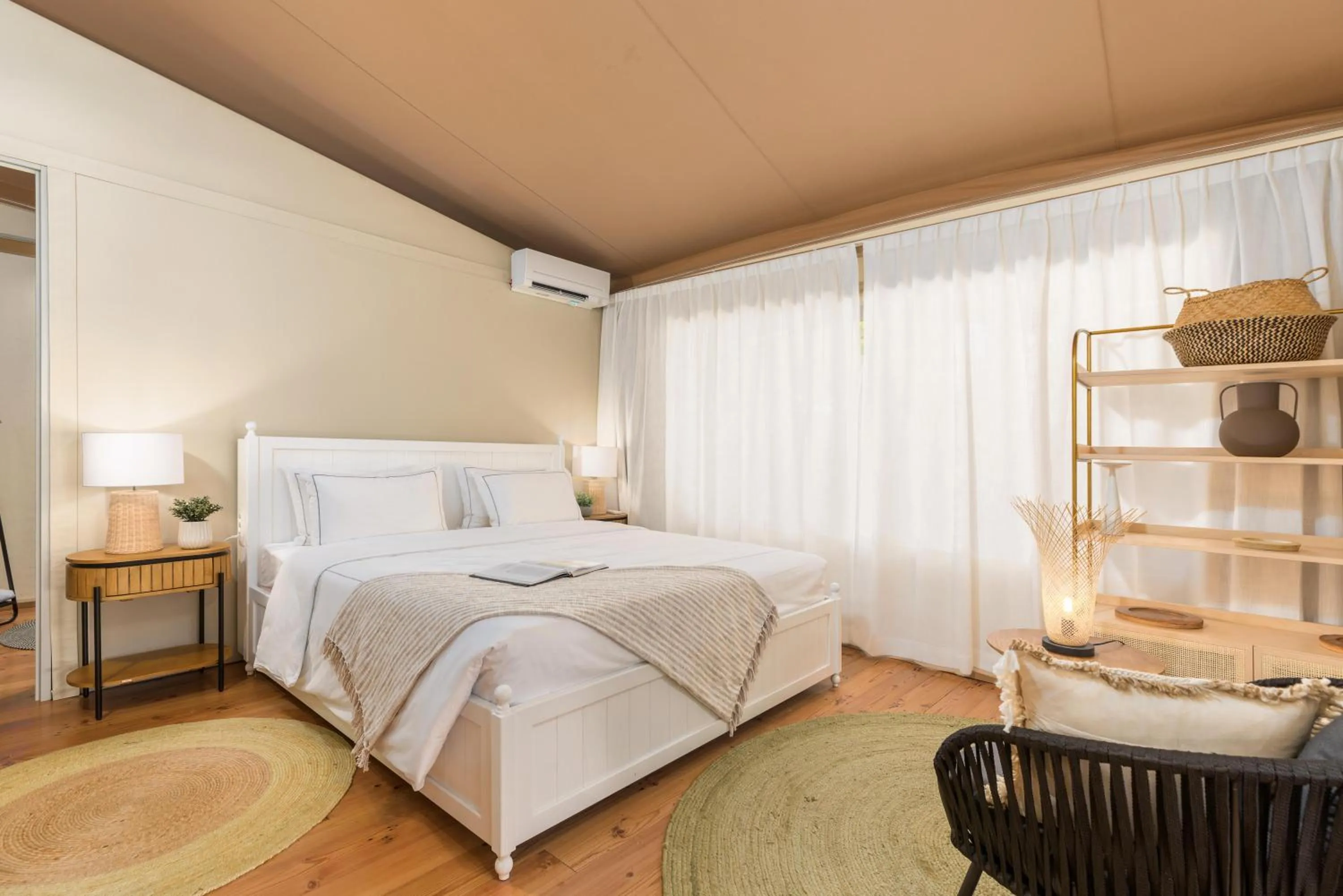 Bed in Arena One 99 Glamping