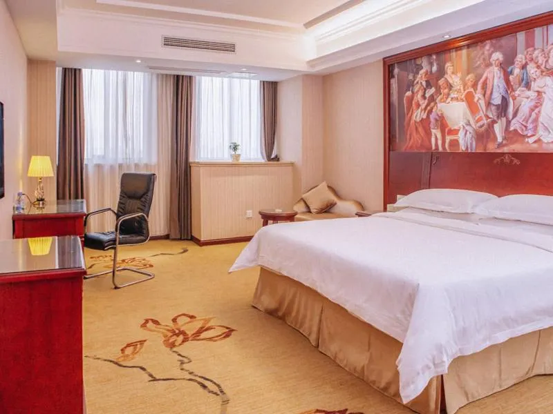 Bed in Vienna Hotel Jiangxi Yingtan International Glasses City