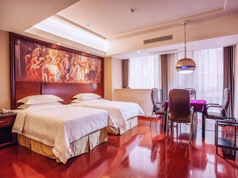 Bed in Vienna Hotel Jiangxi Yingtan International Glasses City