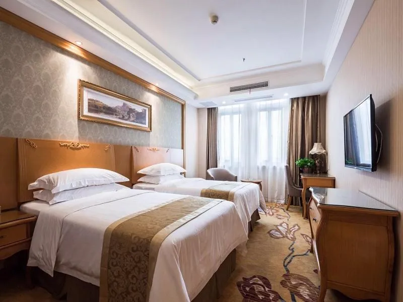 Bed in Vienna Hotel Jiangsu Changzhou Qingfeng Park