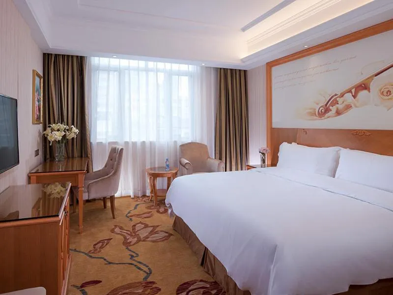 Bed in Vienna Hotel Shenzhen Longshen Subway Station