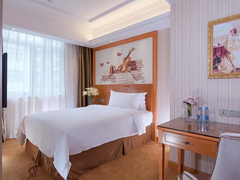 Bed in Vienna Hotel Shenzhen Longshen Subway Station