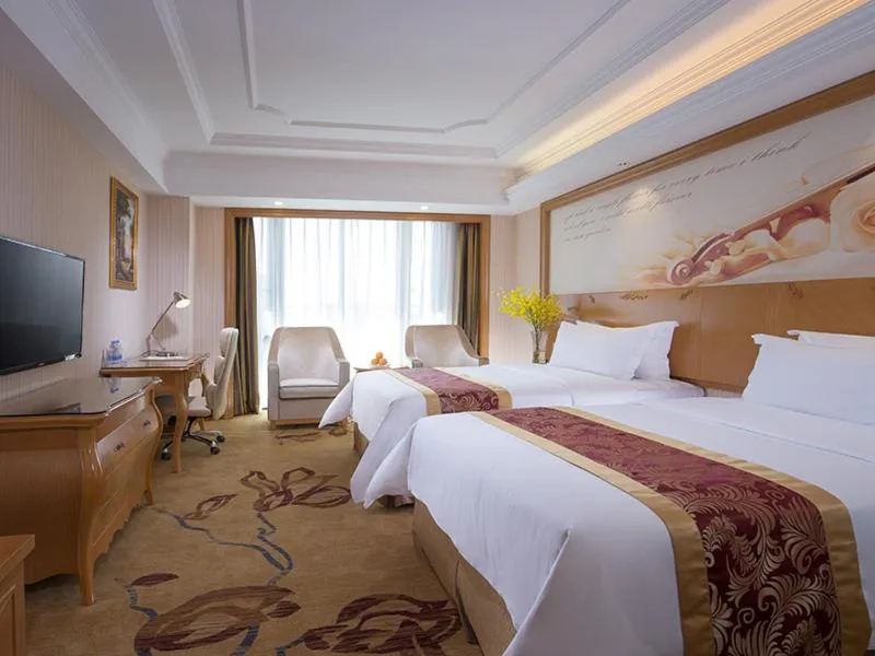 Bed in Vienna International Hotel Foshan Beijiao New City Meidi Headquarter