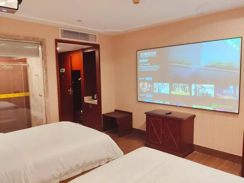 Bed in Vienna International Hotel Guangzhou Jiaokou Subway Station