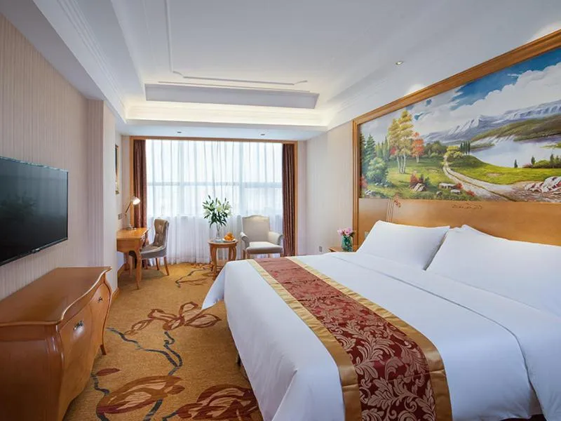 Bed in Venus International Hotel Shenzhen Gongming Tianhong