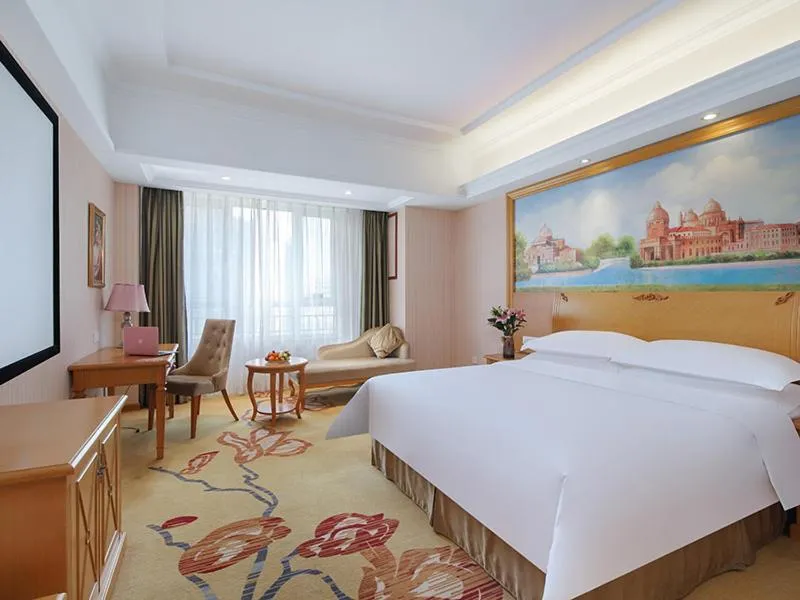 Bed in Vienna Hotel Shandong Qingdao Chengyang