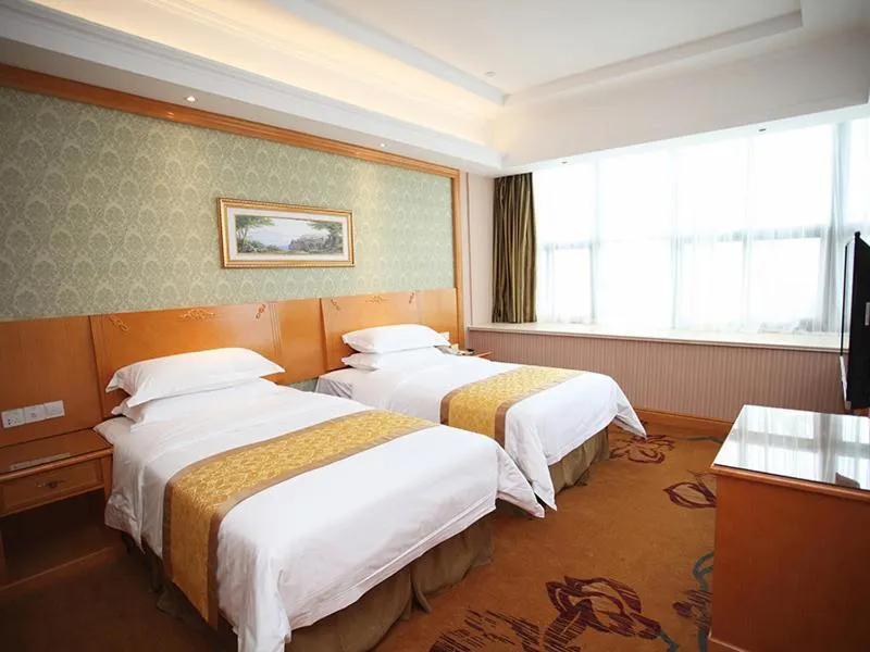 Bed in Vienna Hotel Jiangsu Kunshan Exhibition Center