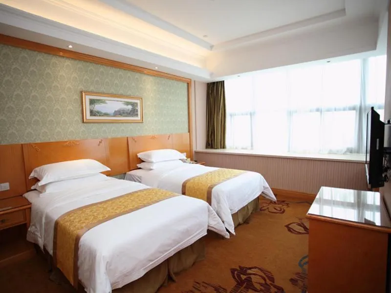 Bed in Vienna Hotel Jiangsu Kunshan Exhibition Center