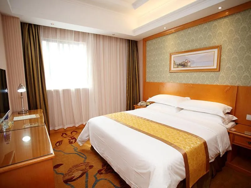 Bed in Vienna Hotel Jiangsu Kunshan Exhibition Center