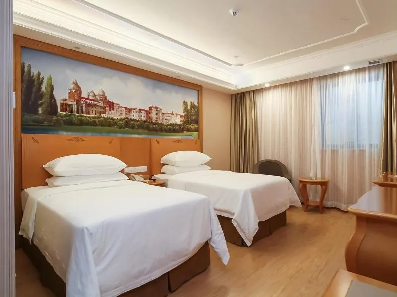 Bed in Vienna Hotel Nanjing Olympic Sports Center