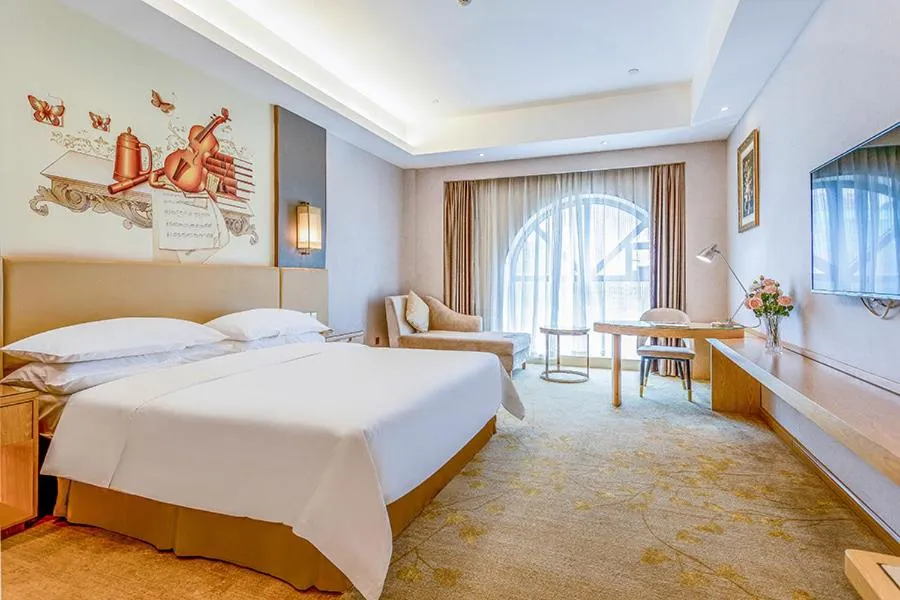 Bed in Vienna International Hotel Guangdong Zhengjiang Renming Avenue Middle Road