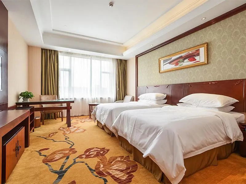 Bed in Vienna Hotel Suzhou Yangcheng Lake Huayi Movie World