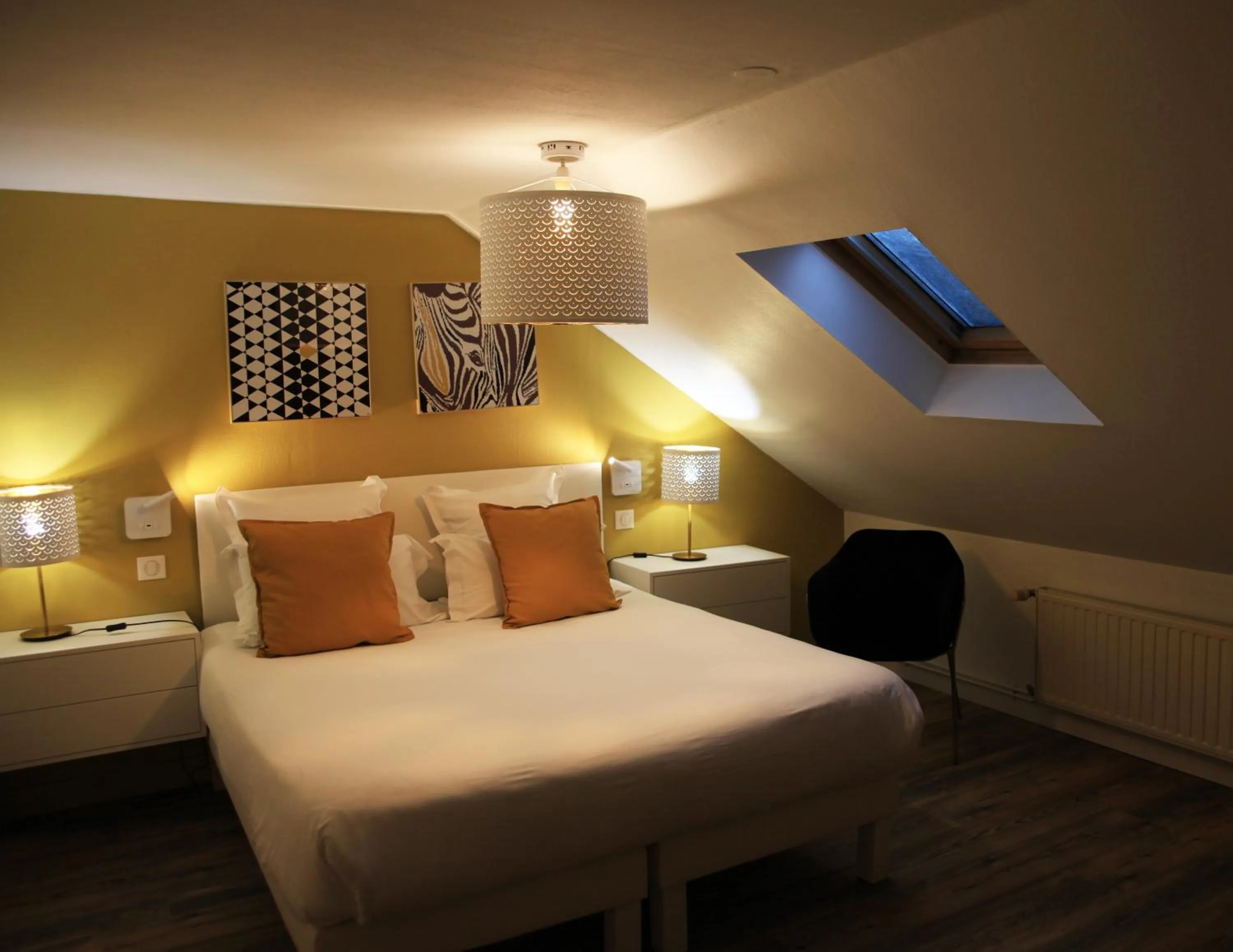 Bed in Hotel Restaurant Les Capucins