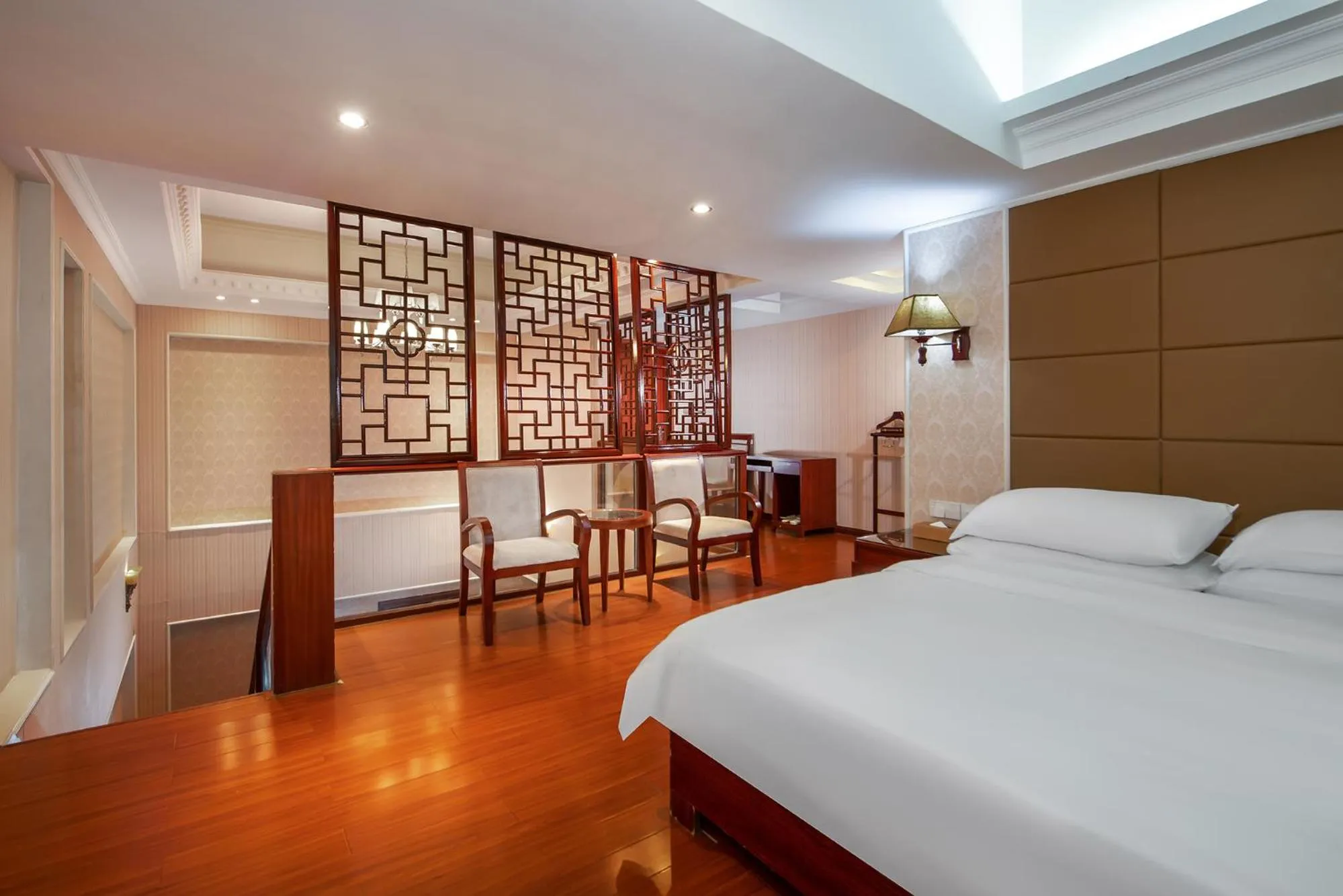 Bed in Vienna International Hotel Jieyang Jieyanglou