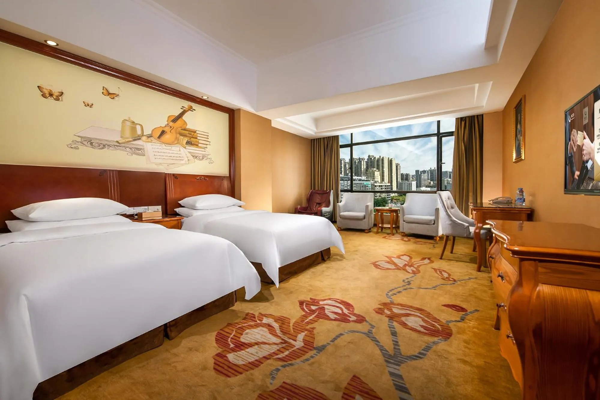 Bed in Vienna International Hotel Jieyang Jieyanglou