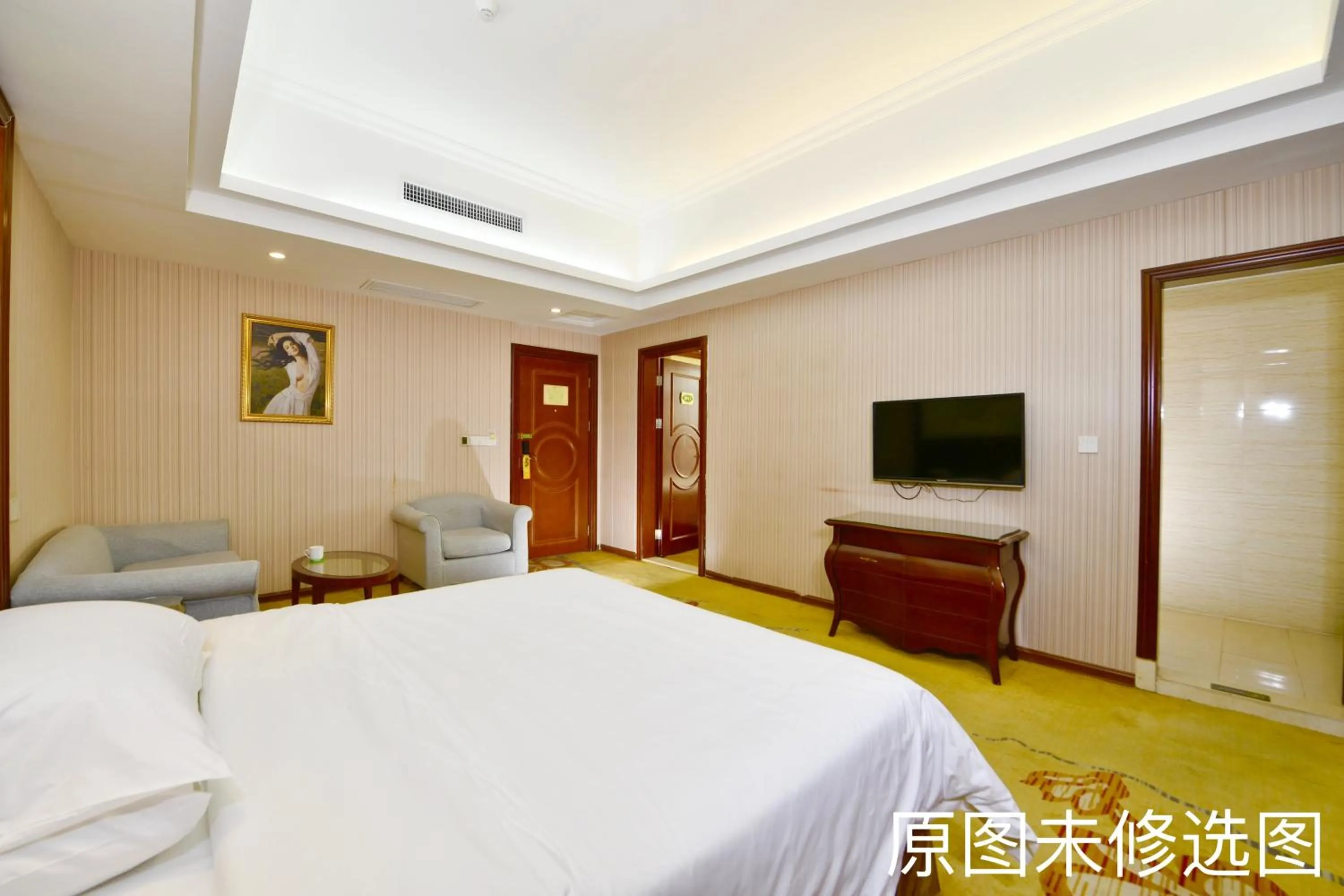 Bed in Vienna International Hotel Jieyang Jieyanglou