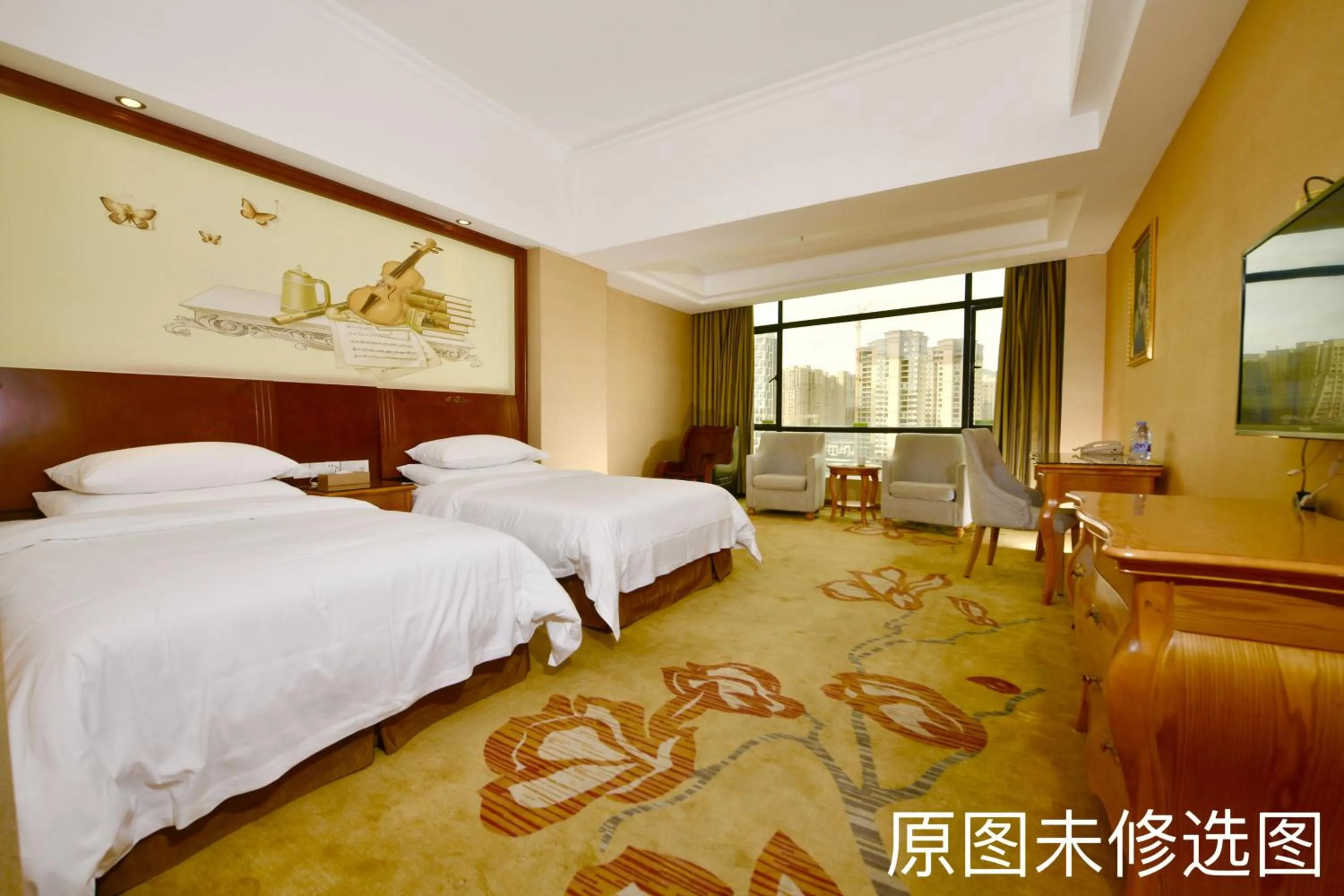 Bed in Vienna International Hotel Jieyang Jieyanglou