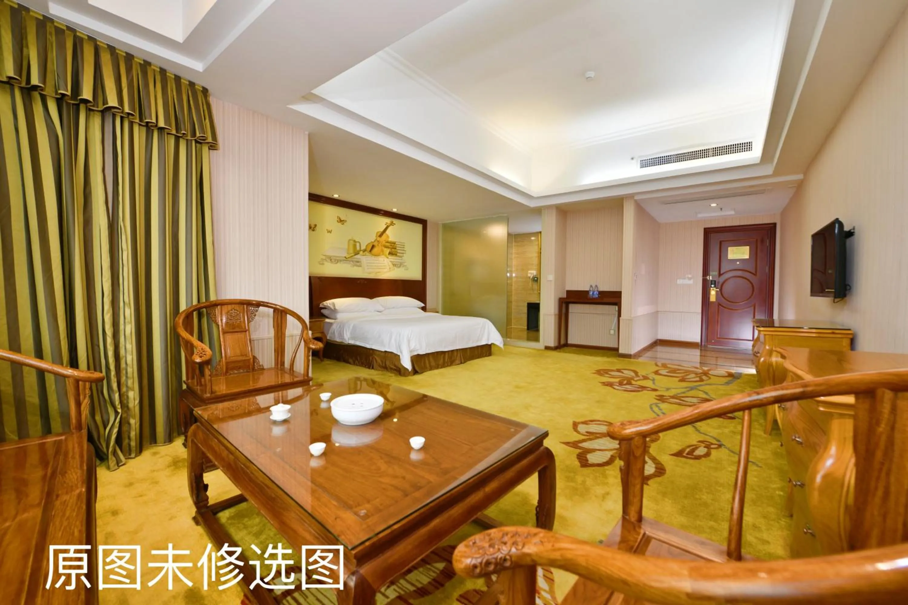 Bed in Vienna International Hotel Jieyang Jieyanglou
