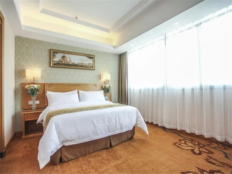 Bed in Vienna Hotel Fuzhou Linchuan Avenue