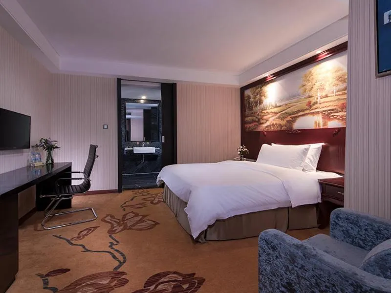 Bed in Vienna International Hotel Shantou Chenghai Waisha Bridge