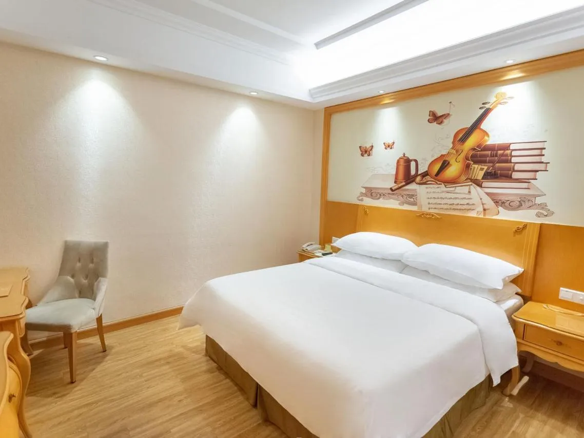 Bed in Vienna Hotel Guangzhou Beijing Road